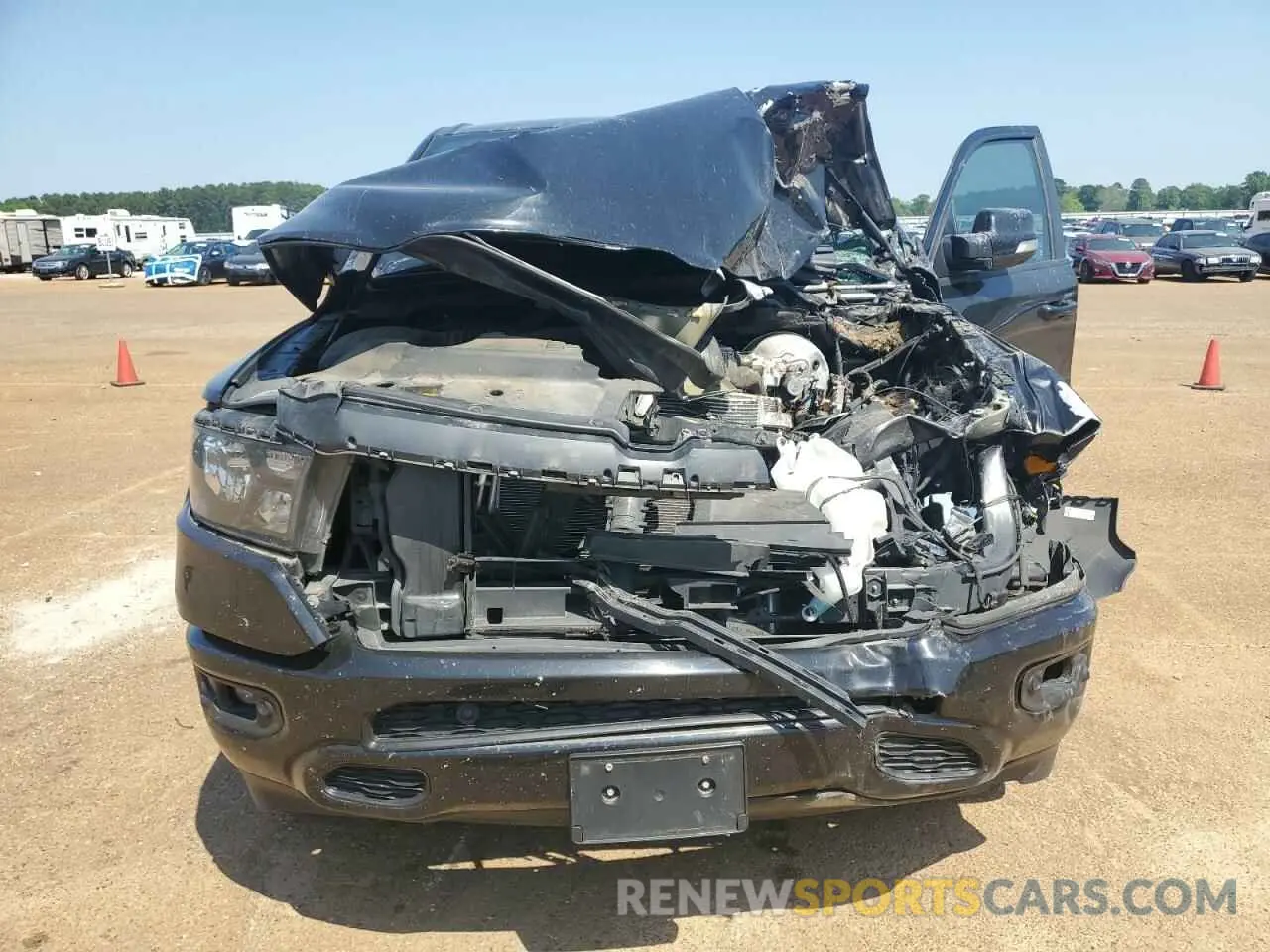 12 Photograph of a damaged car 1C6SRFFTXMN570655 RAM 1500 2021