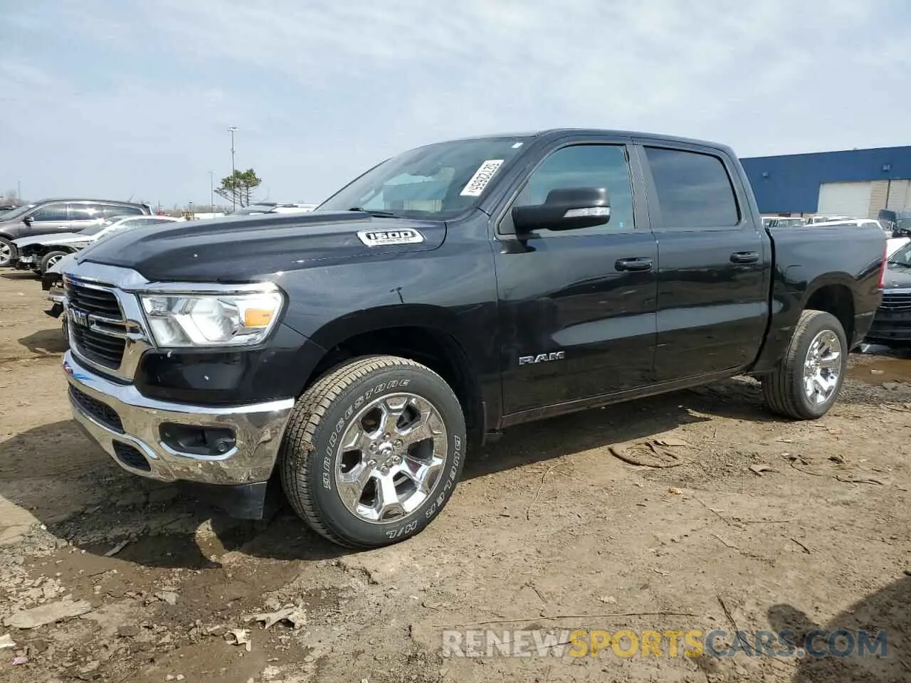 1 Photograph of a damaged car 1C6SRFFTXMN642017 RAM 1500 2021