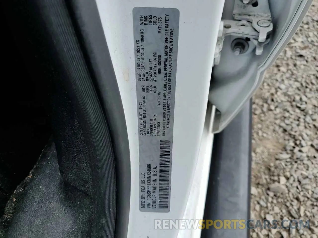 12 Photograph of a damaged car 1C6SRFFTXMN724006 RAM 1500 2021