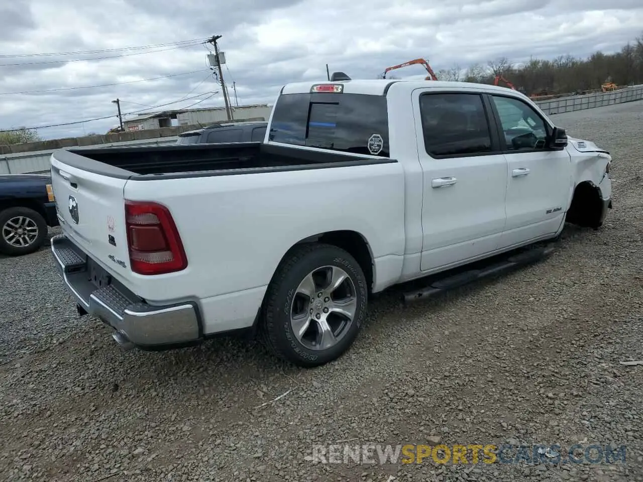 3 Photograph of a damaged car 1C6SRFFTXMN724006 RAM 1500 2021