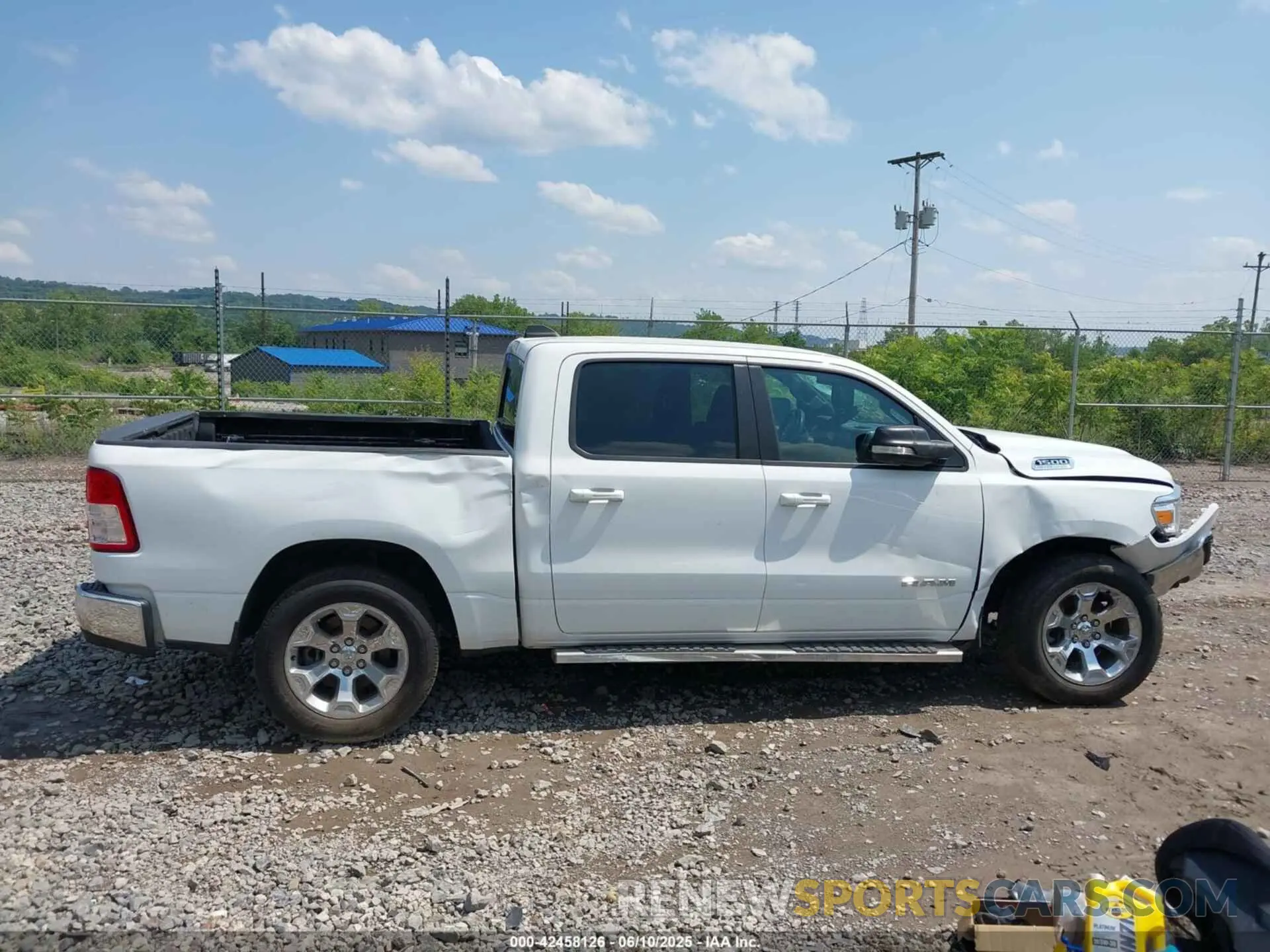 12 Photograph of a damaged car 1C6SRFFTXMN728301 RAM 1500 2021
