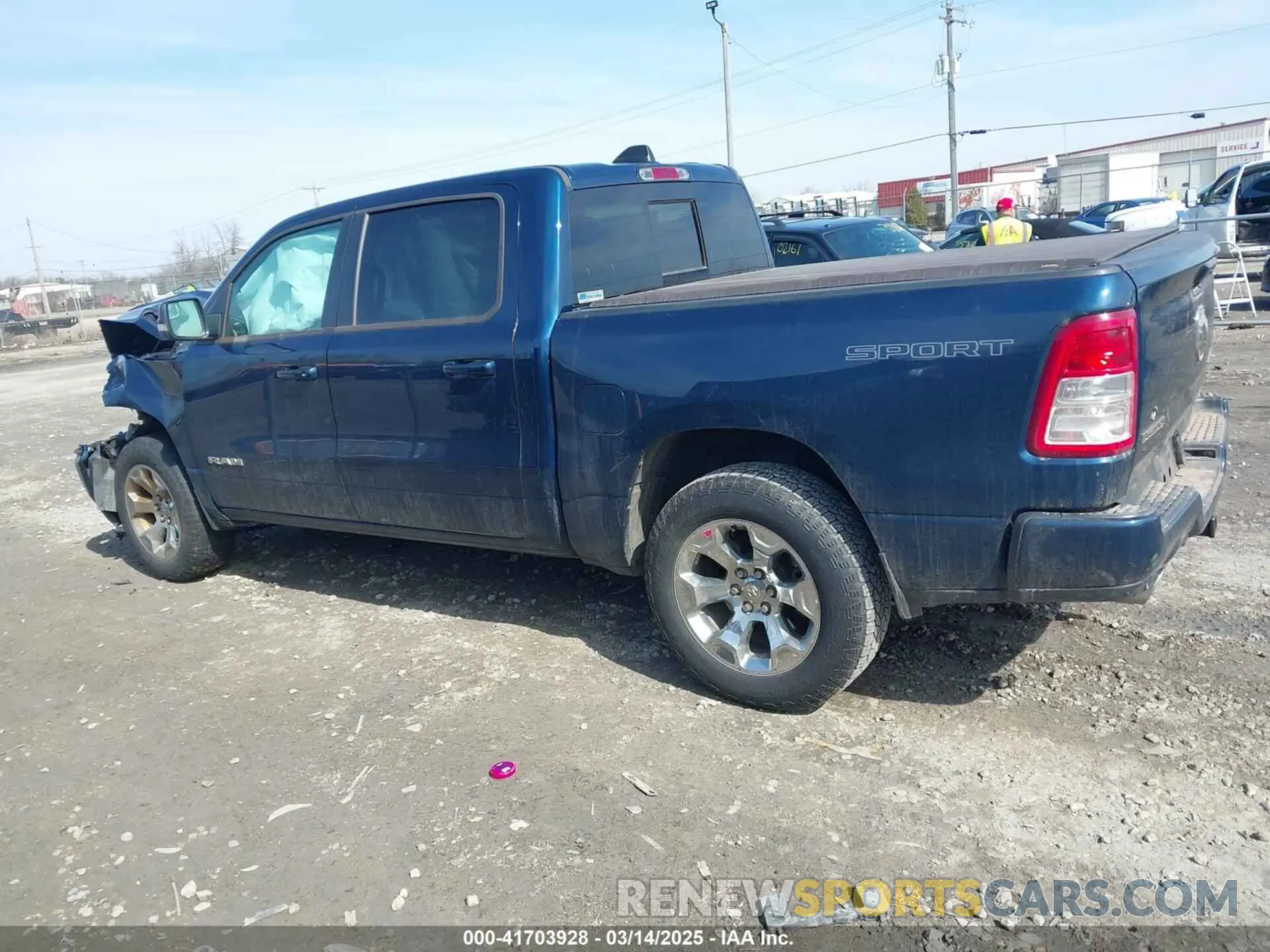 14 Photograph of a damaged car 1C6SRFFTXMN781077 RAM 1500 2021