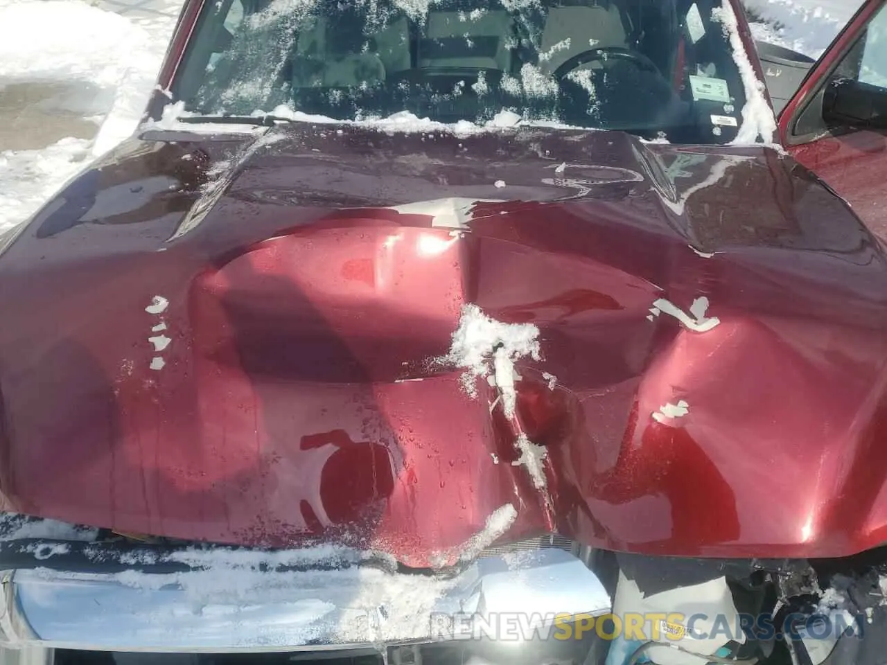11 Photograph of a damaged car 1C6SRFFTXMN797148 RAM 1500 2021