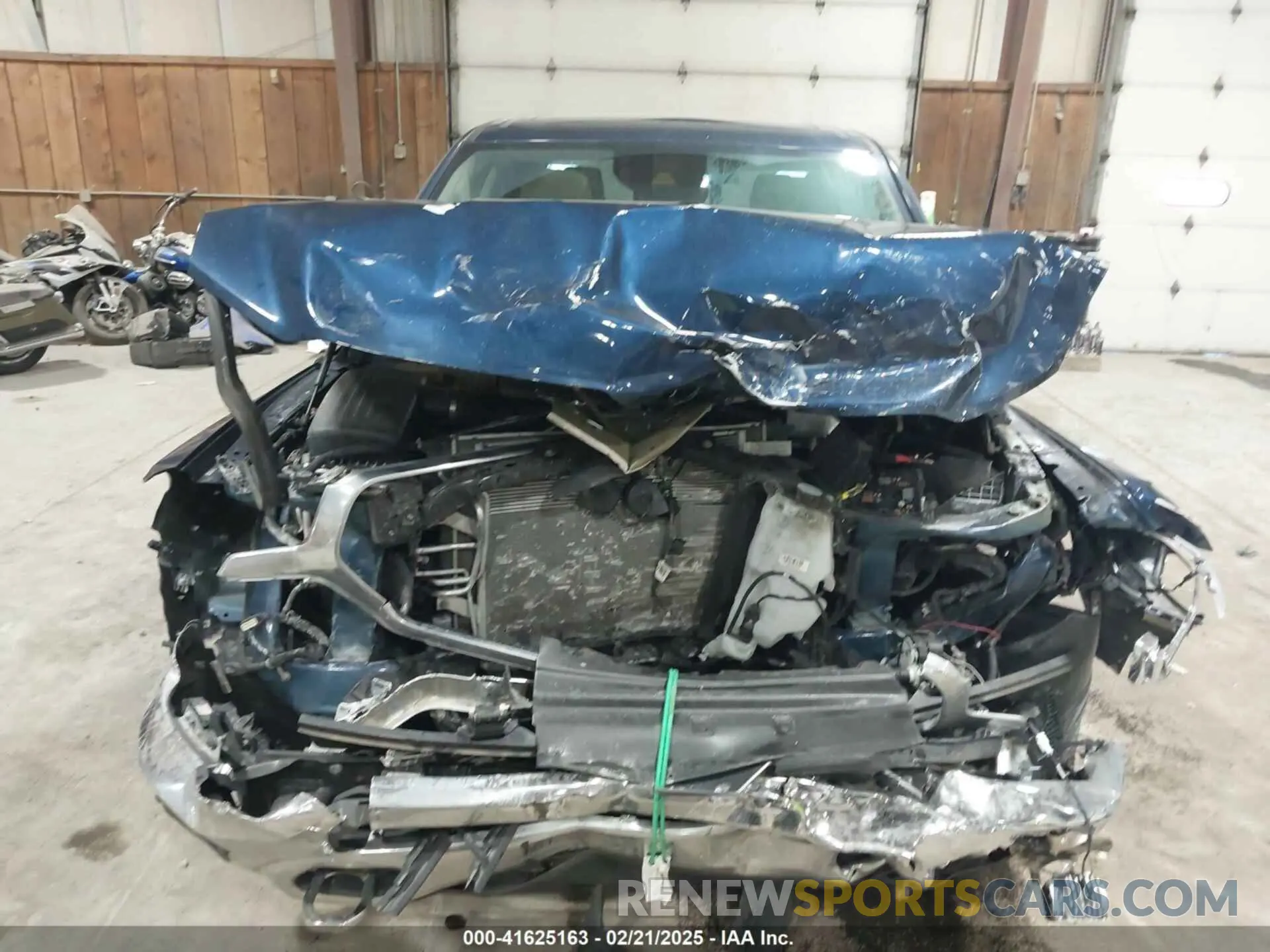 12 Photograph of a damaged car 1C6SRFHM5MN501037 RAM 1500 2021