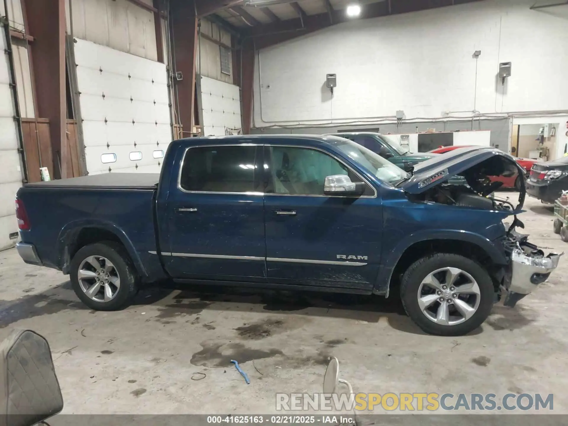 13 Photograph of a damaged car 1C6SRFHM5MN501037 RAM 1500 2021