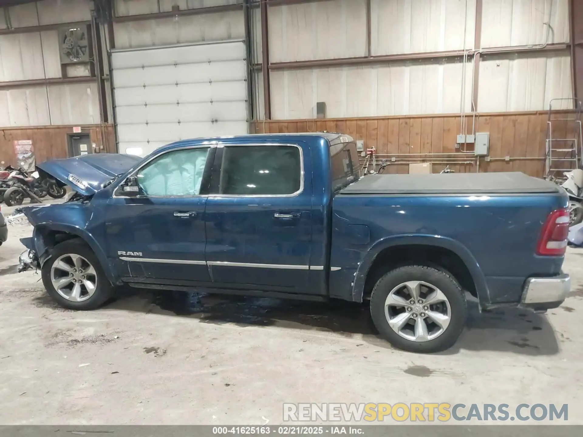 14 Photograph of a damaged car 1C6SRFHM5MN501037 RAM 1500 2021