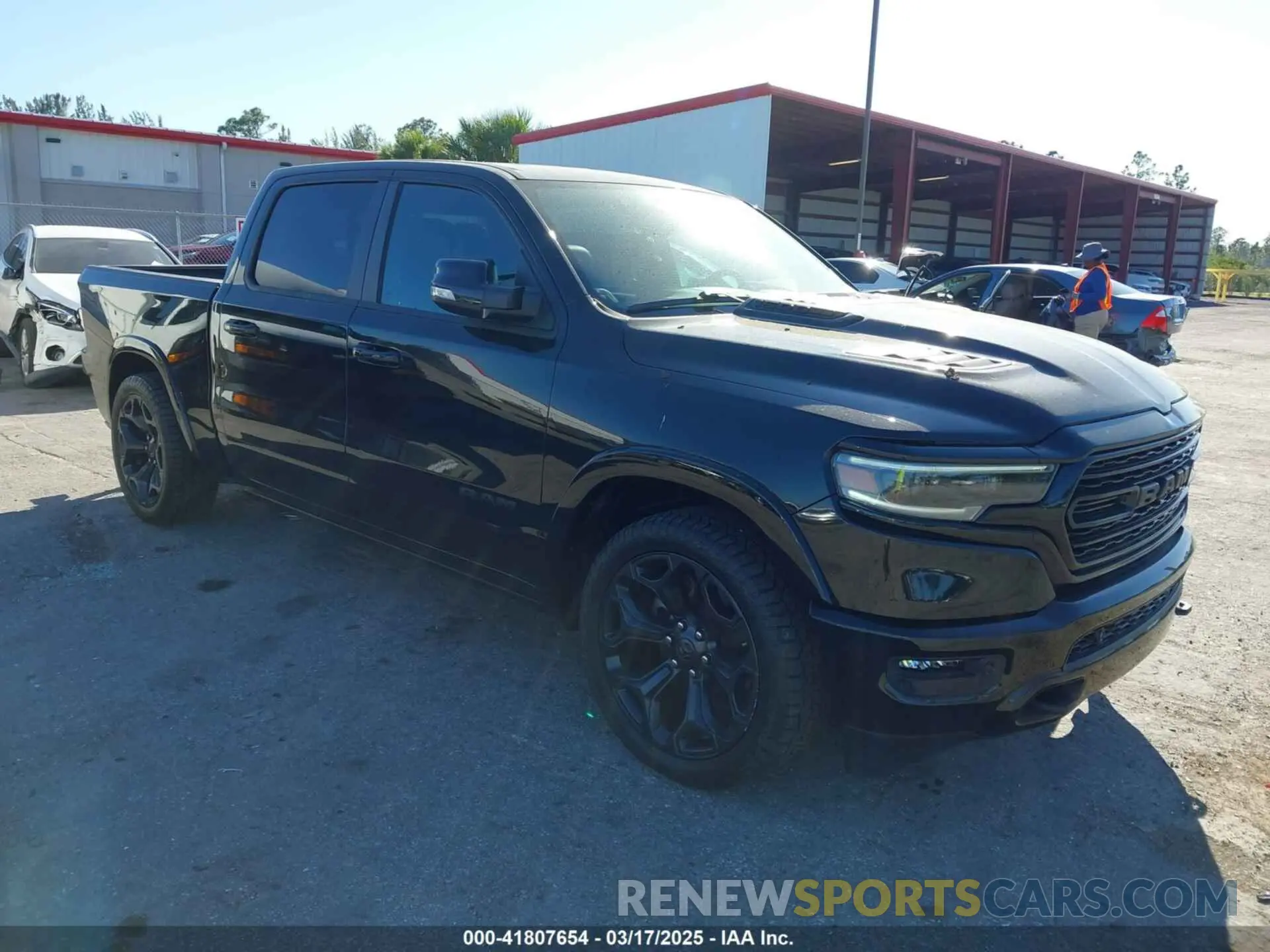 1 Photograph of a damaged car 1C6SRFHMXMN644565 RAM 1500 2021