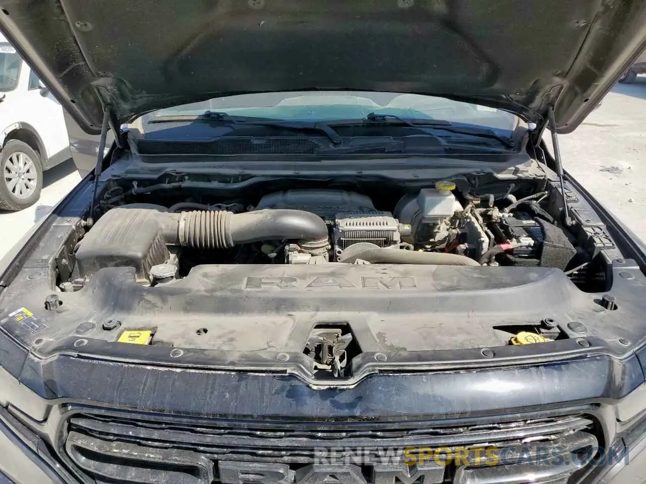 11 Photograph of a damaged car 1C6SRFHT0MN553926 RAM 1500 2021