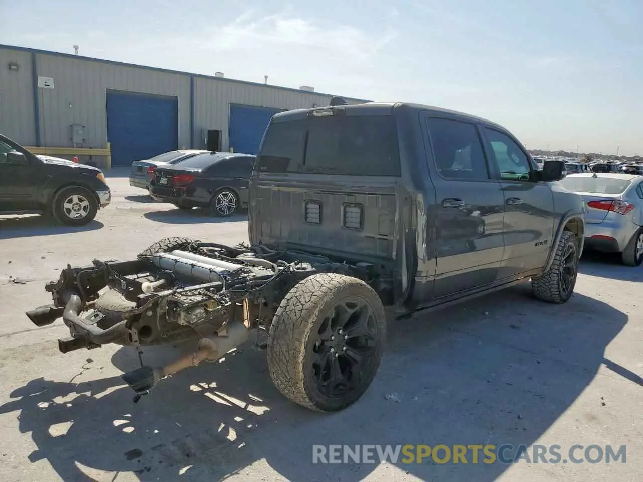 3 Photograph of a damaged car 1C6SRFHT0MN553926 RAM 1500 2021