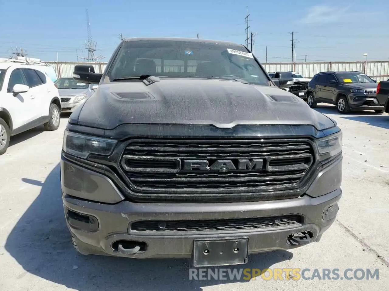 5 Photograph of a damaged car 1C6SRFHT0MN553926 RAM 1500 2021