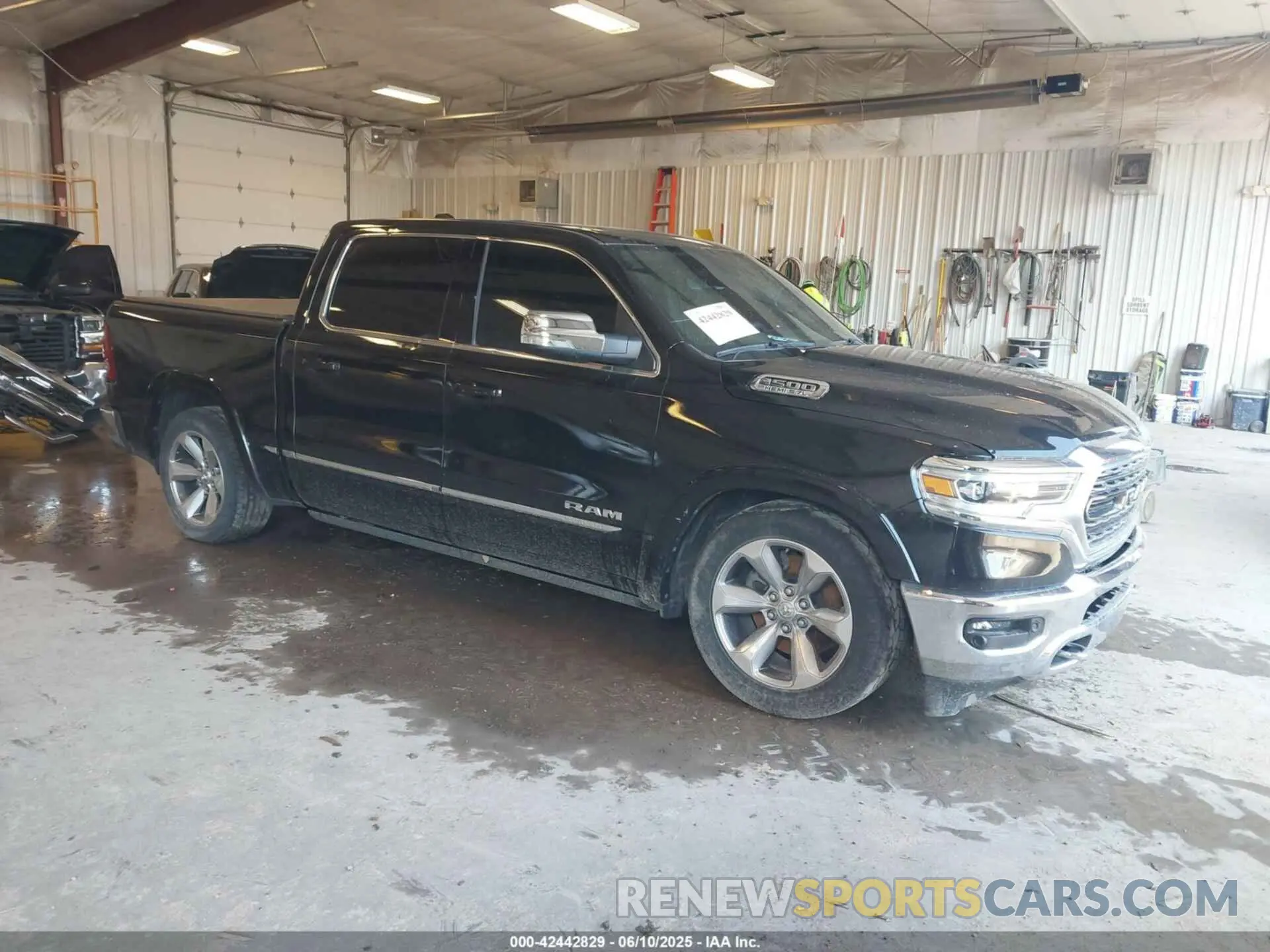 1 Photograph of a damaged car 1C6SRFHT7MN830717 RAM 1500 2021
