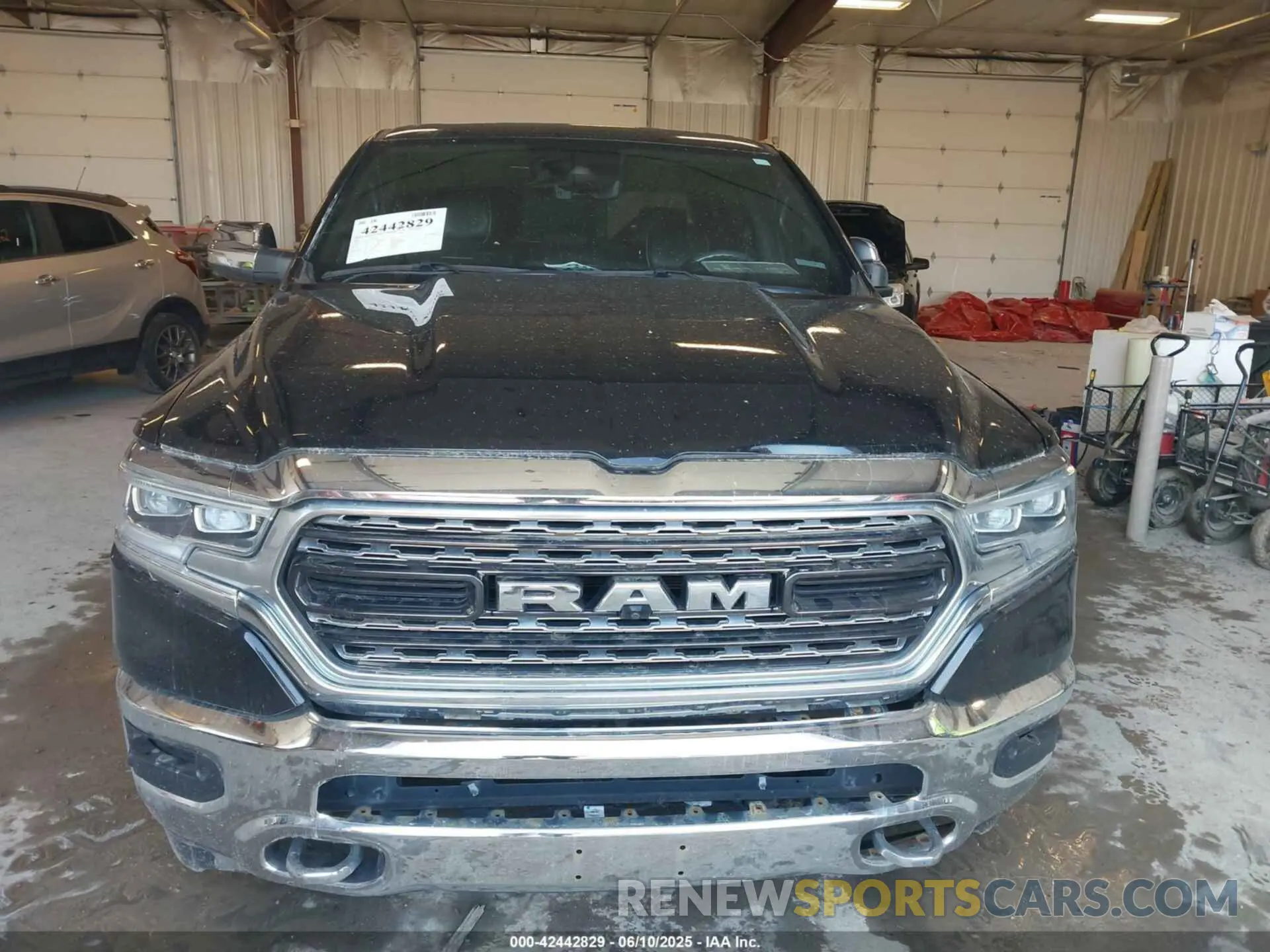 12 Photograph of a damaged car 1C6SRFHT7MN830717 RAM 1500 2021