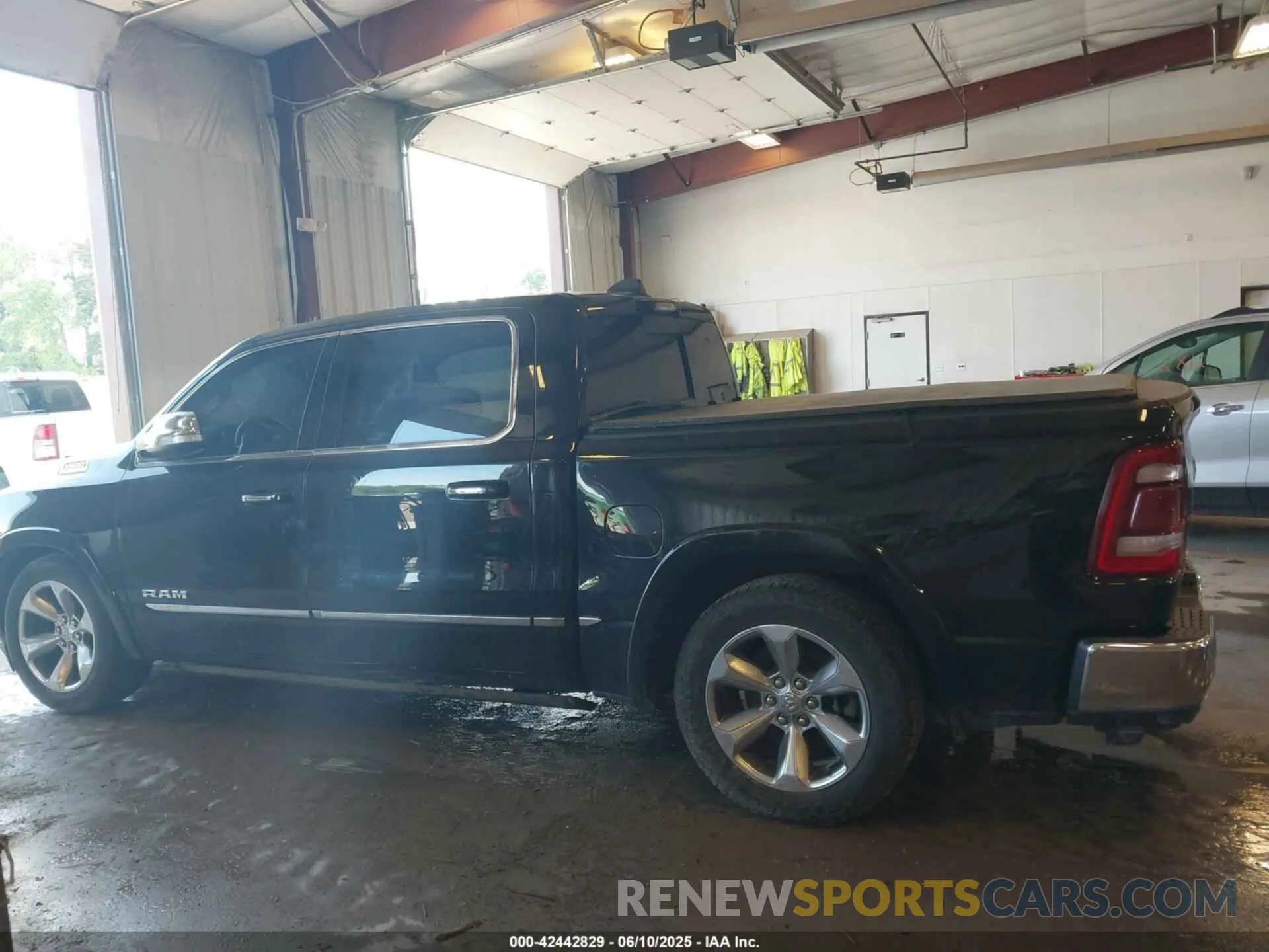 14 Photograph of a damaged car 1C6SRFHT7MN830717 RAM 1500 2021