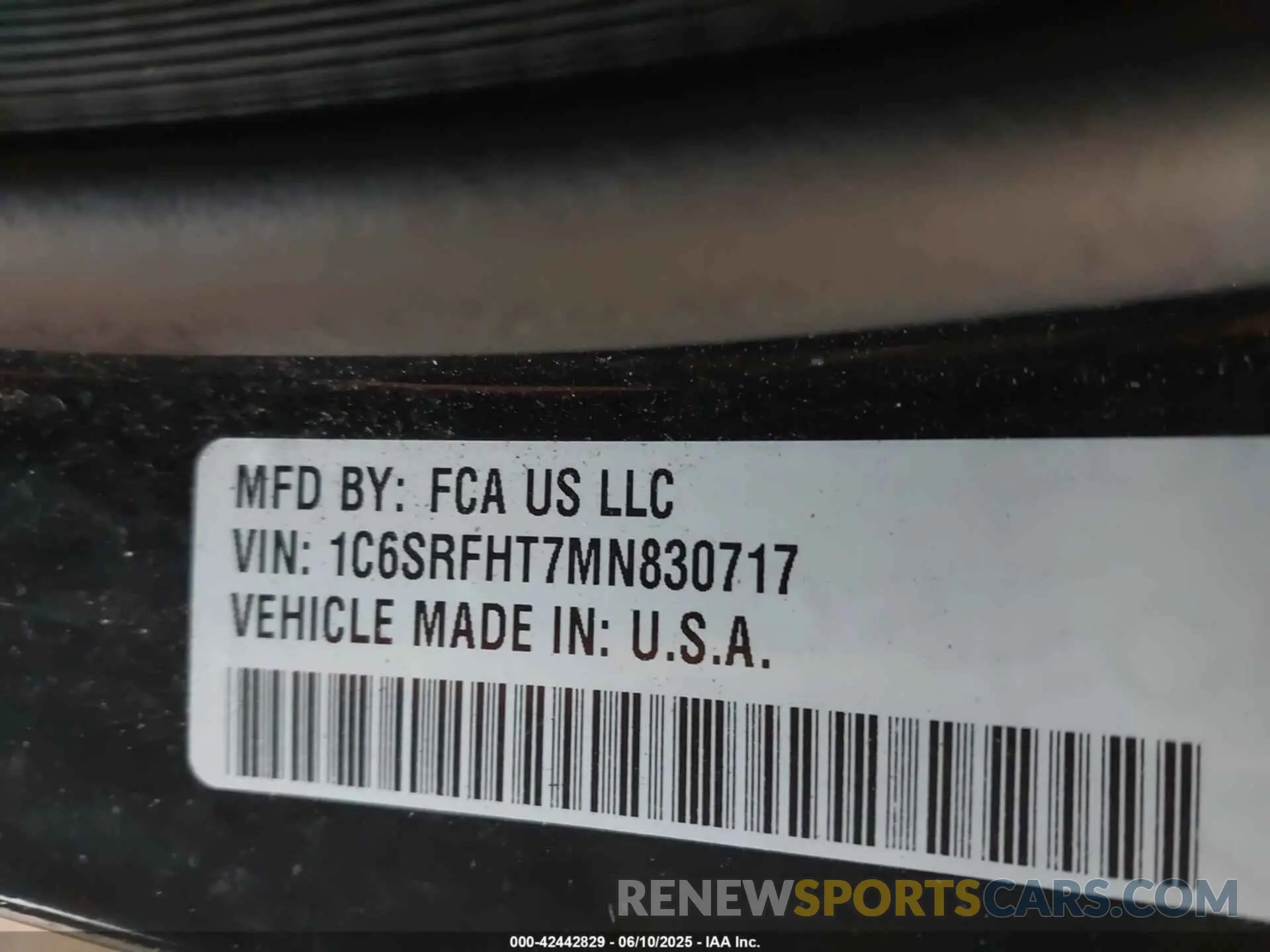 9 Photograph of a damaged car 1C6SRFHT7MN830717 RAM 1500 2021