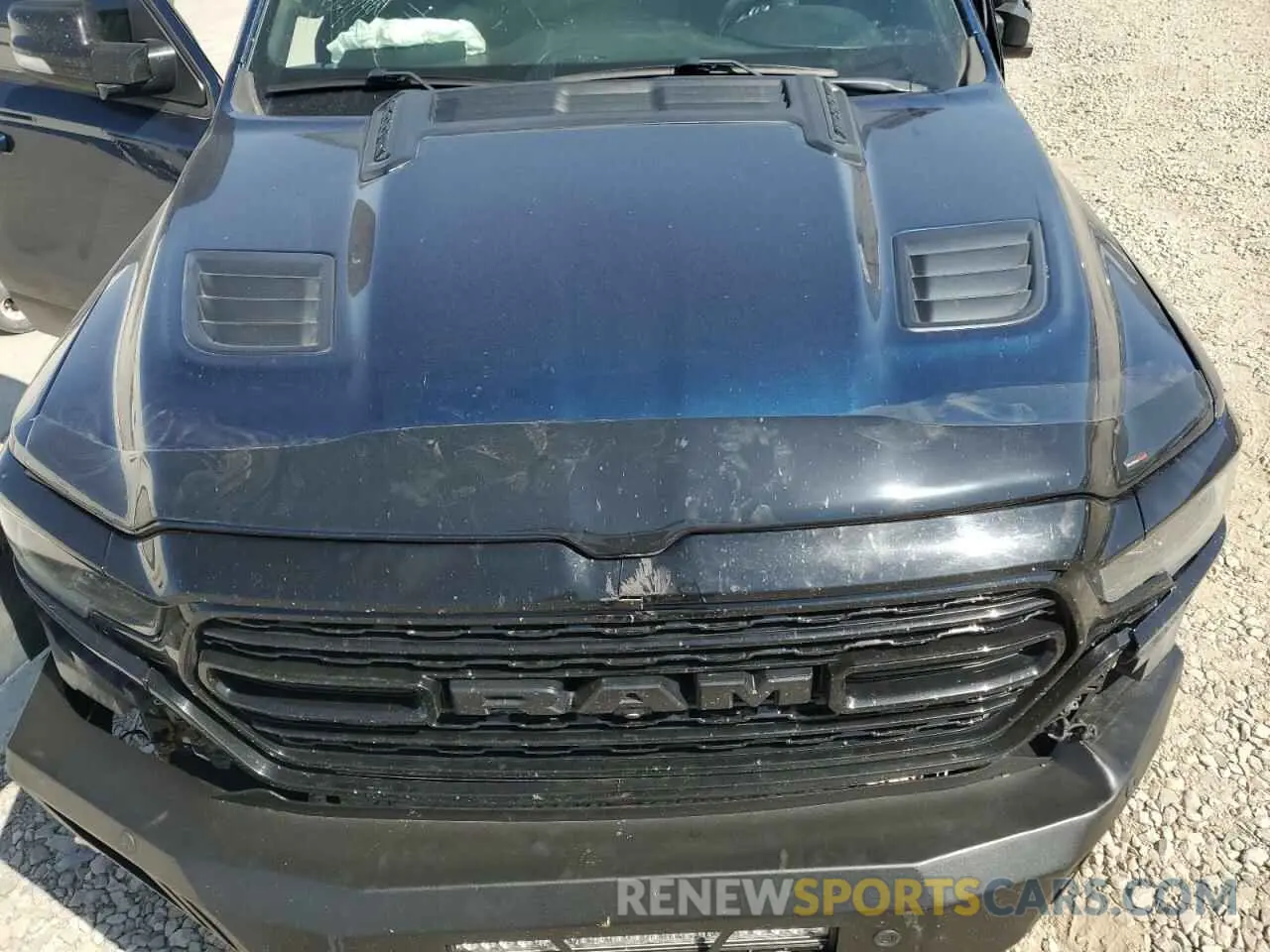 11 Photograph of a damaged car 1C6SRFHT8MN535156 RAM 1500 2021