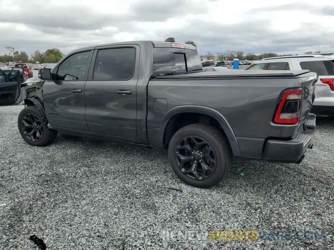 2 Photograph of a damaged car 1C6SRFHT9MN552032 RAM 1500 2021