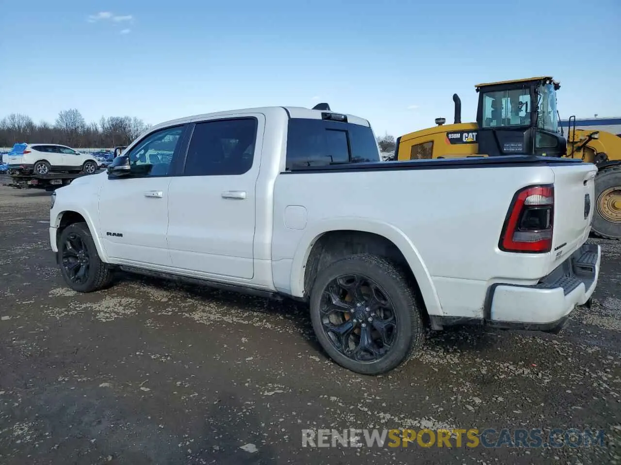 2 Photograph of a damaged car 1C6SRFHT9MN812994 RAM 1500 2021
