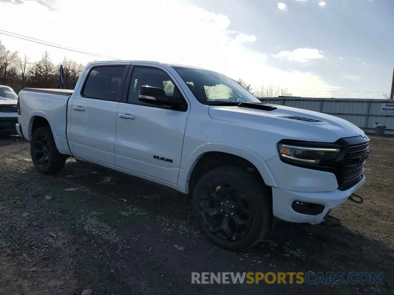4 Photograph of a damaged car 1C6SRFHT9MN812994 RAM 1500 2021
