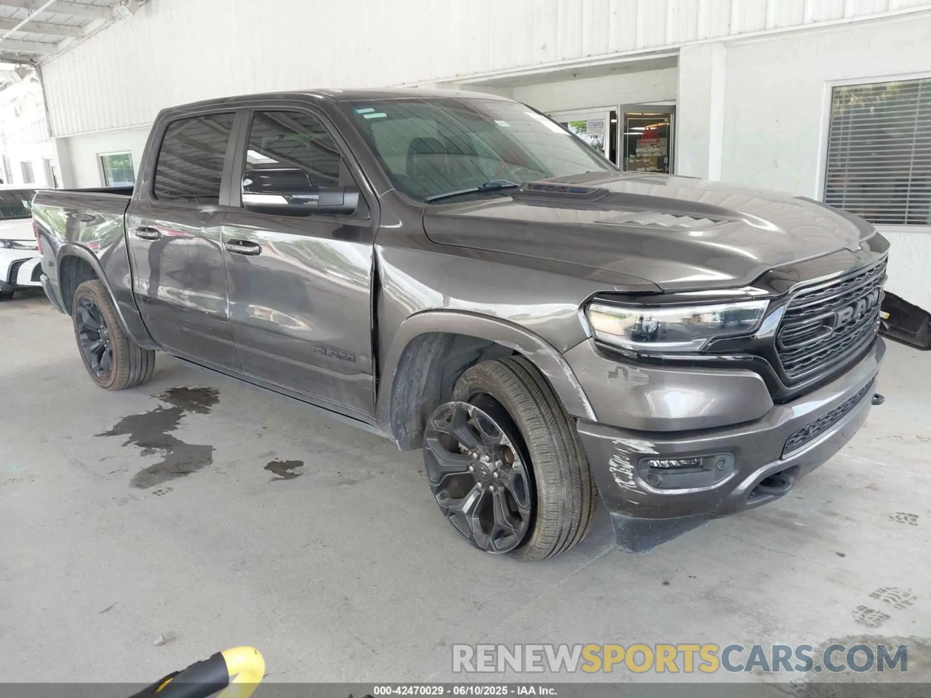 1 Photograph of a damaged car 1C6SRFHTXMN536566 RAM 1500 2021