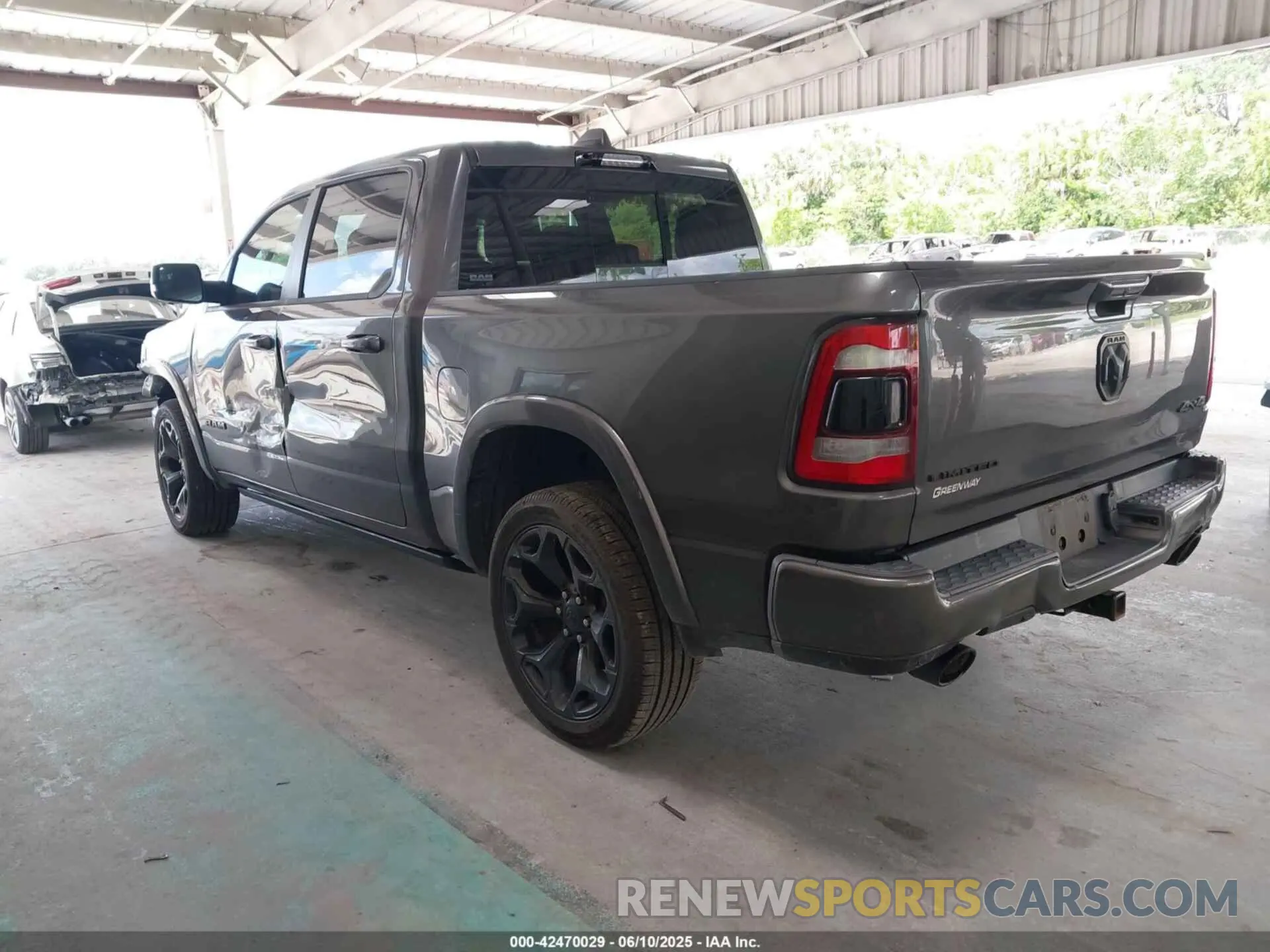 3 Photograph of a damaged car 1C6SRFHTXMN536566 RAM 1500 2021