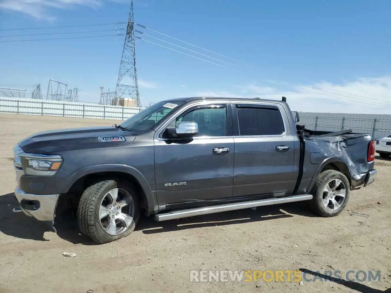1 Photograph of a damaged car 1C6SRFJM0MN836037 RAM 1500 2021