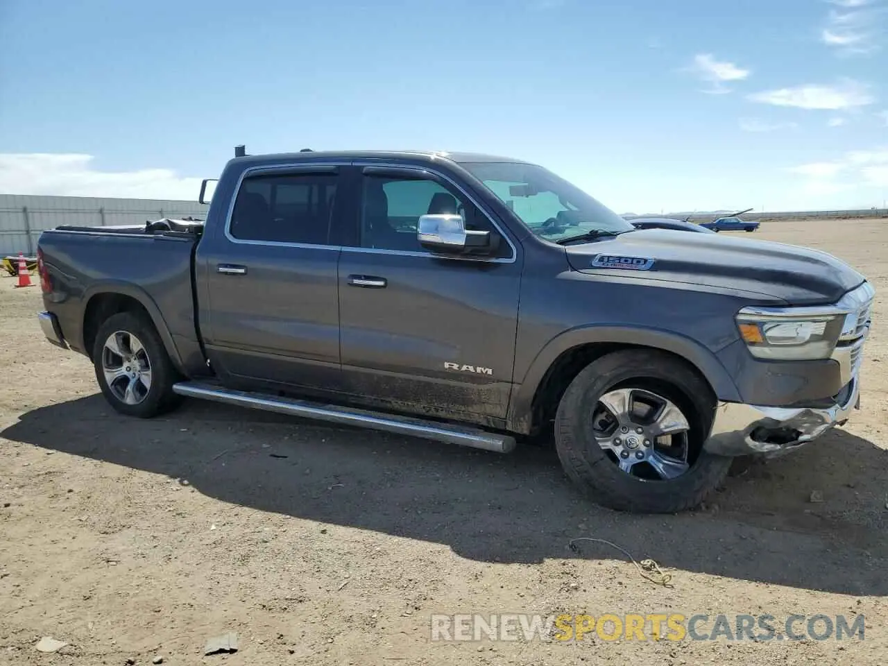 4 Photograph of a damaged car 1C6SRFJM0MN836037 RAM 1500 2021
