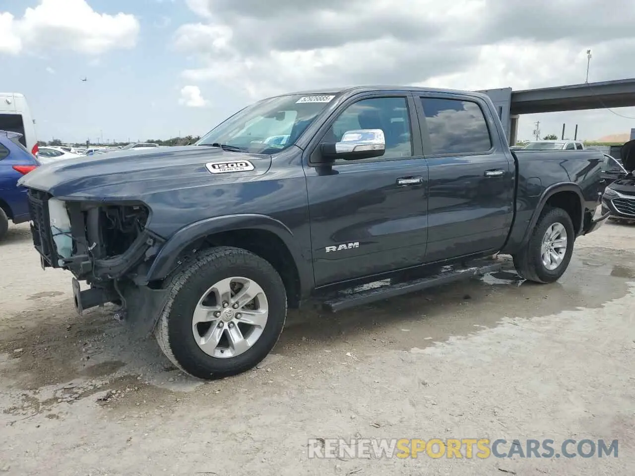 1 Photograph of a damaged car 1C6SRFJT1MN714830 RAM 1500 2021