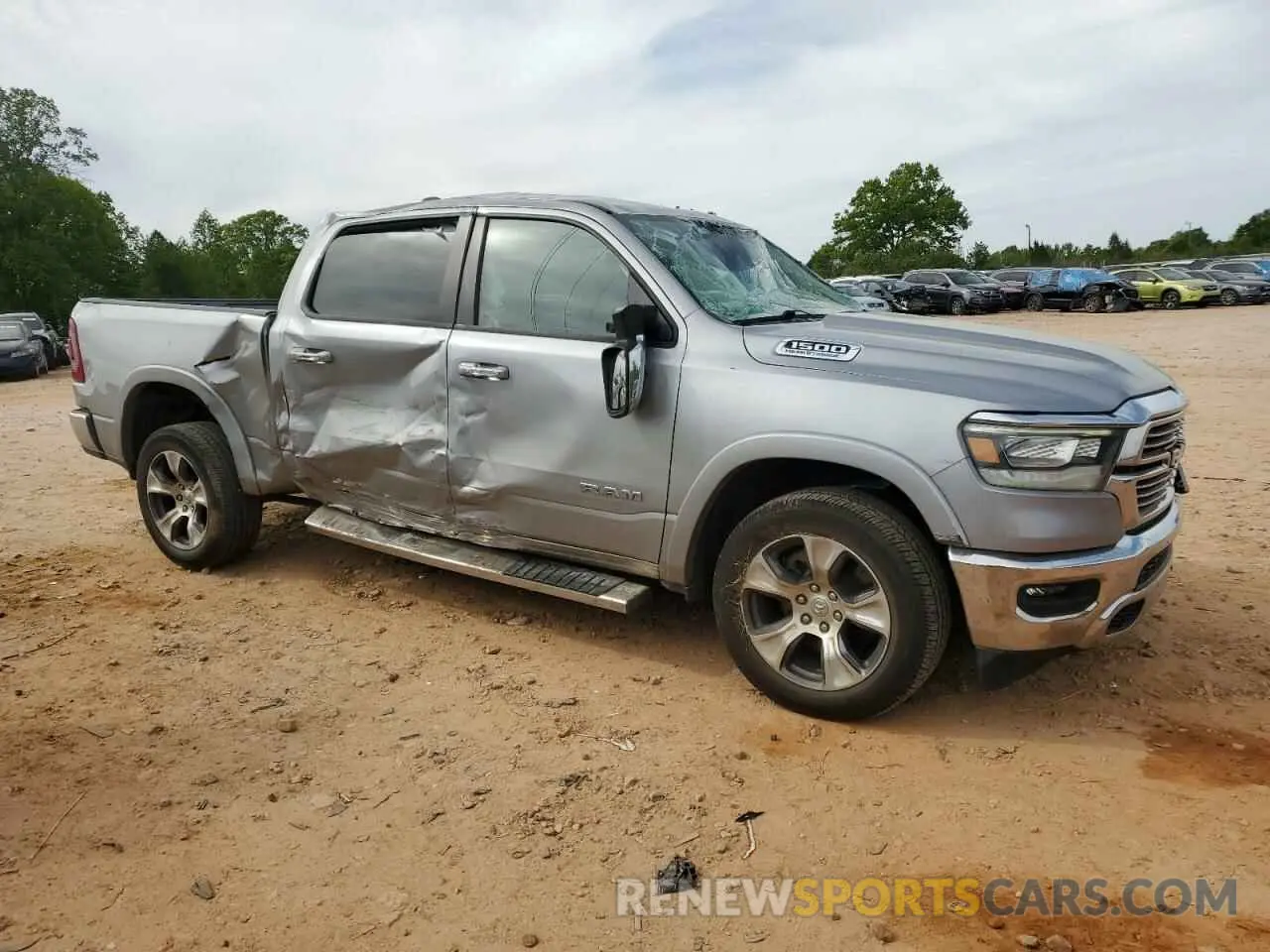 4 Photograph of a damaged car 1C6SRFJT1MN770377 RAM 1500 2021