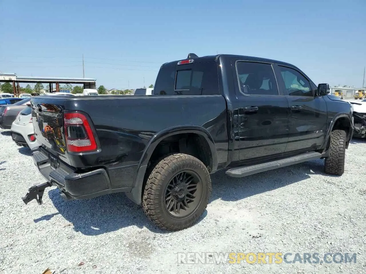 3 Photograph of a damaged car 1C6SRFJT1MN823126 RAM 1500 2021