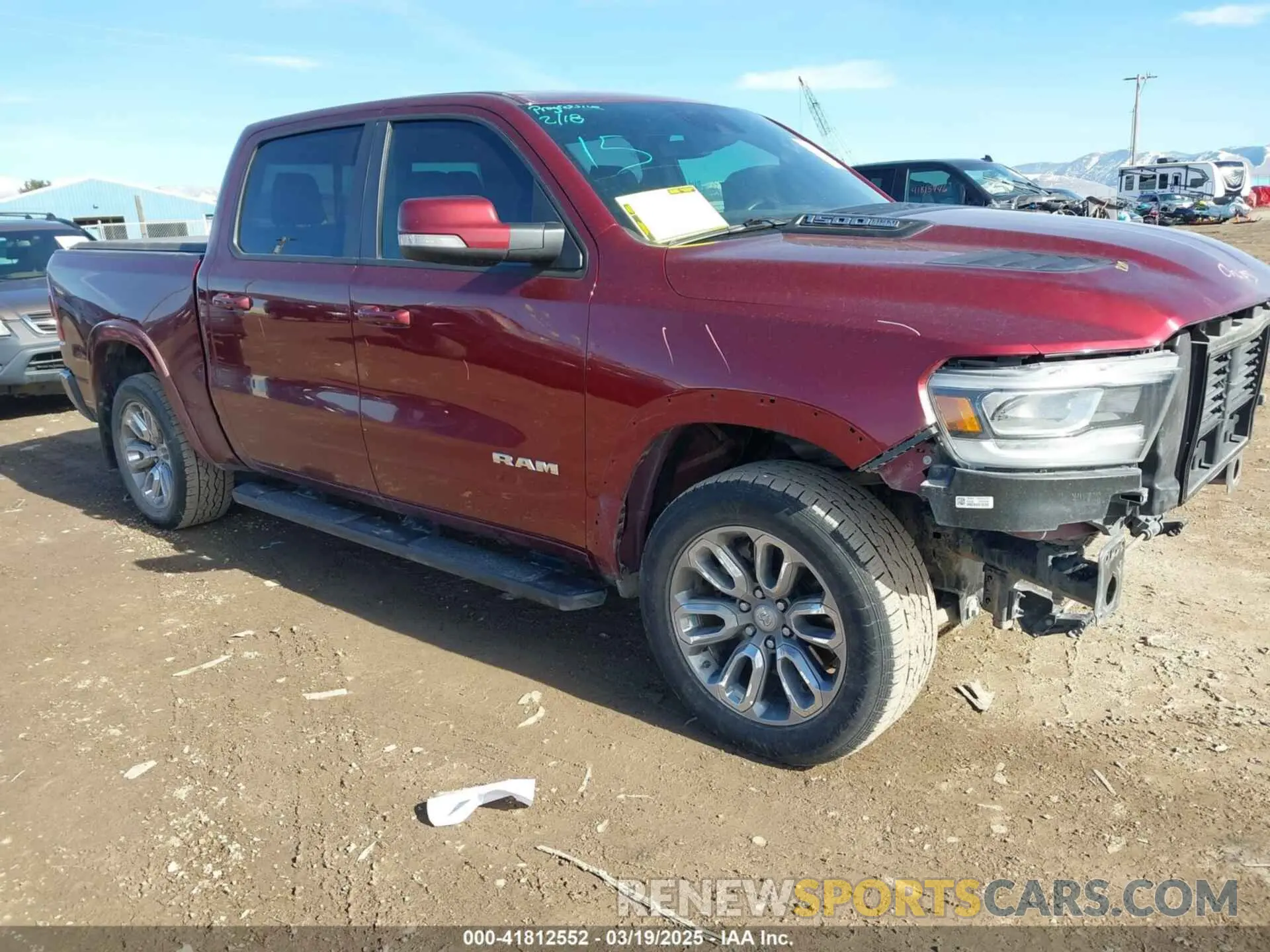 1 Photograph of a damaged car 1C6SRFJT2MN525409 RAM 1500 2021
