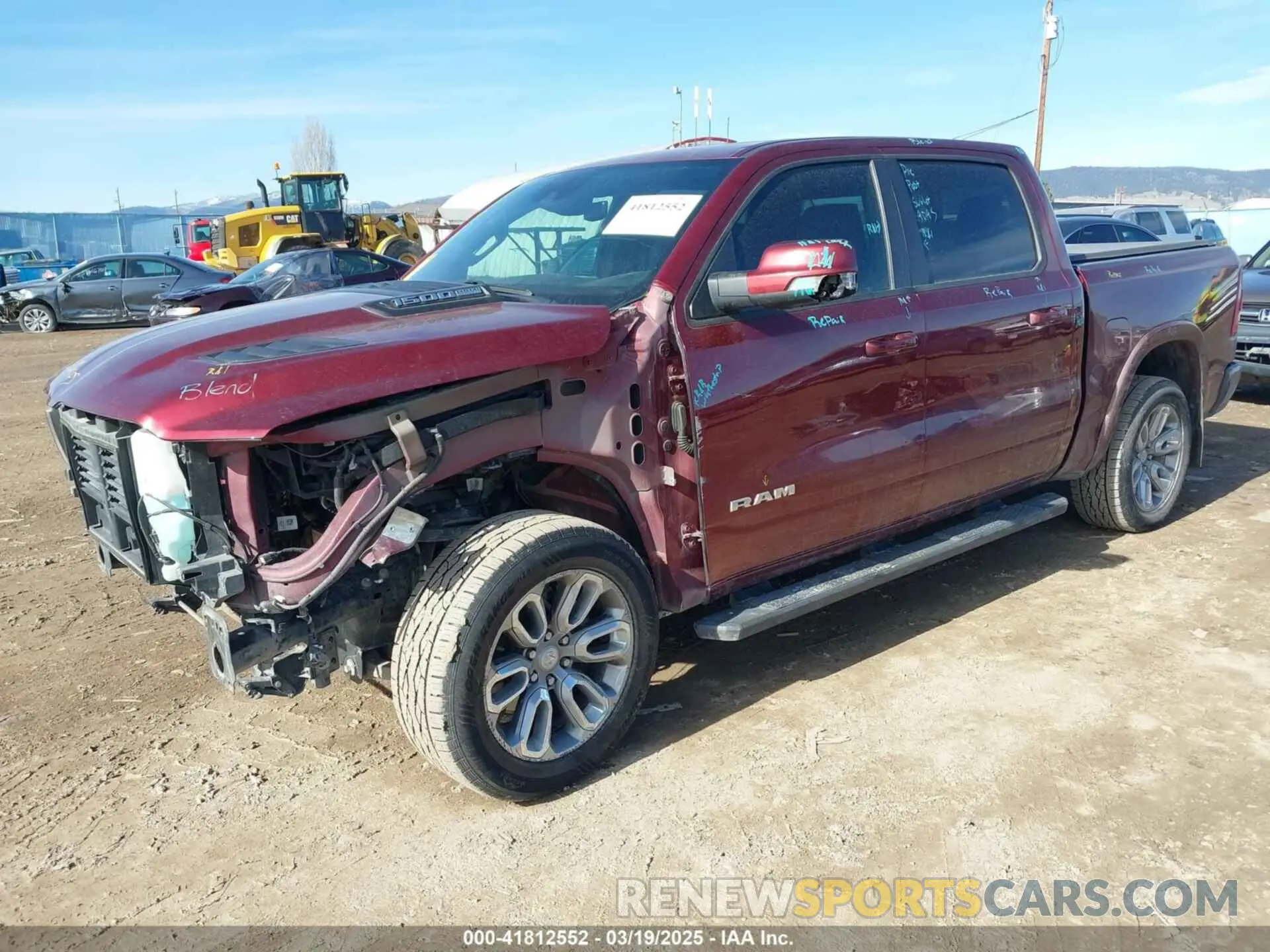 2 Photograph of a damaged car 1C6SRFJT2MN525409 RAM 1500 2021