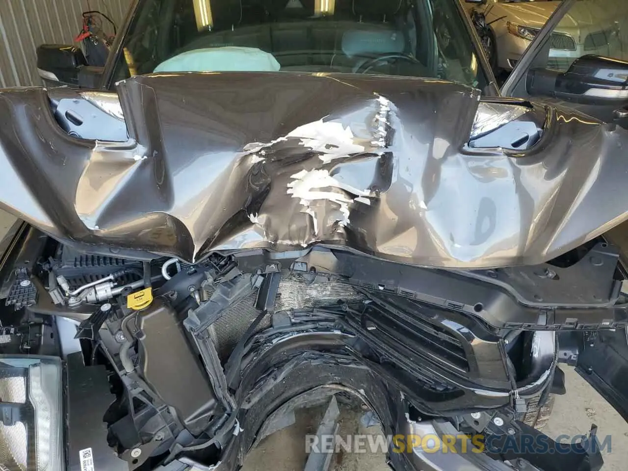 11 Photograph of a damaged car 1C6SRFJT2MN657943 RAM 1500 2021
