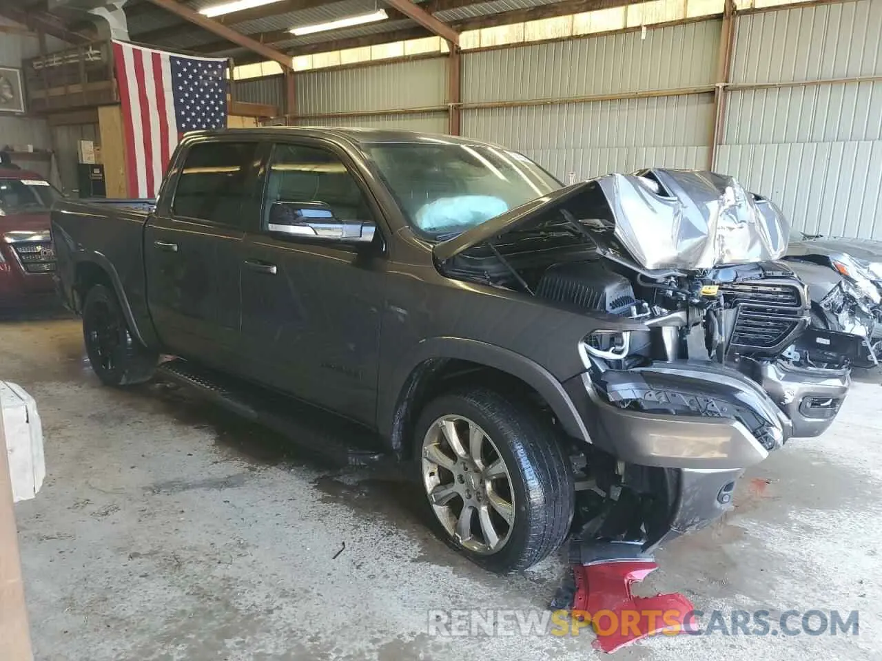 4 Photograph of a damaged car 1C6SRFJT2MN657943 RAM 1500 2021