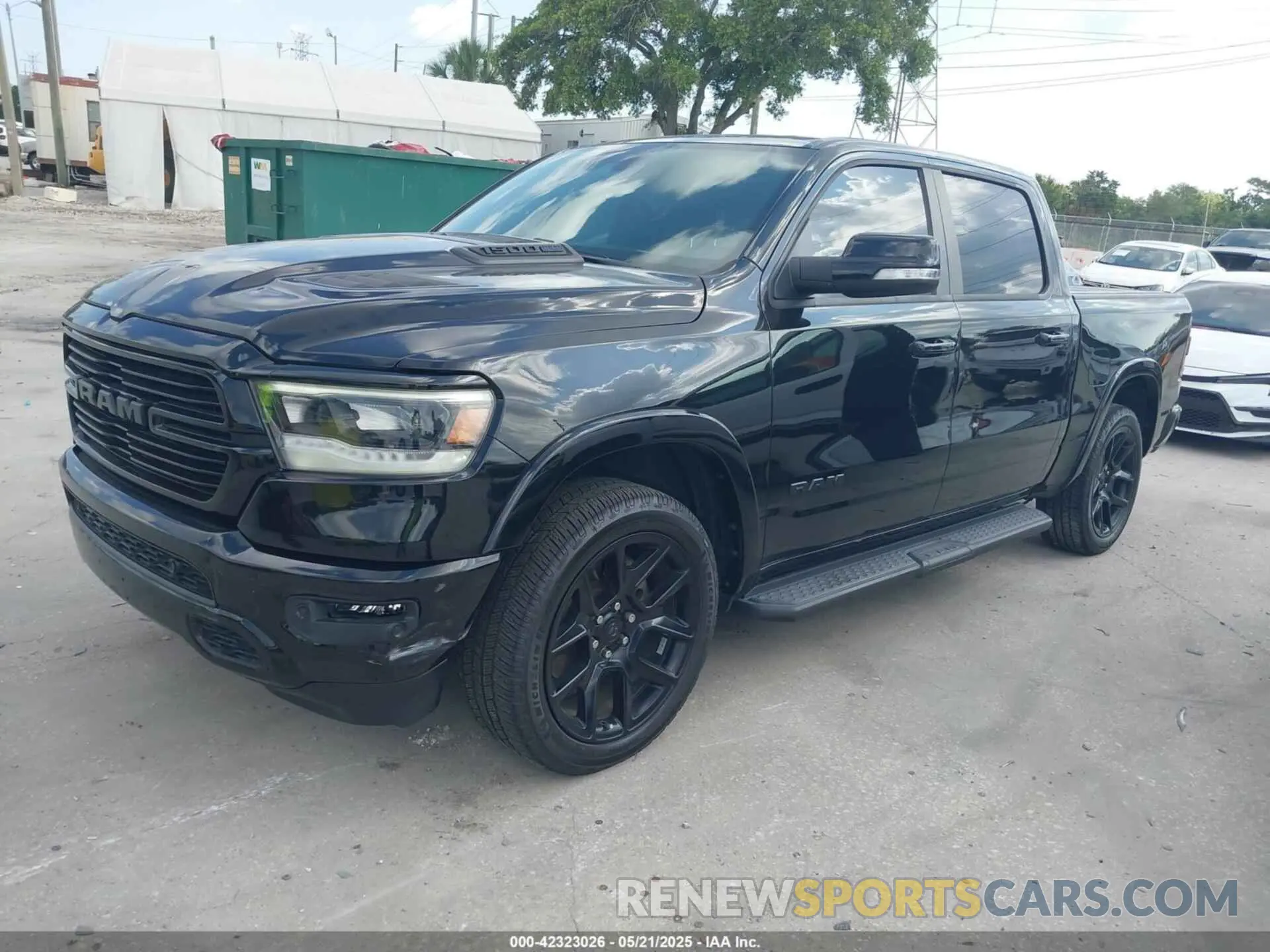 2 Photograph of a damaged car 1C6SRFJT3MN520395 RAM 1500 2021