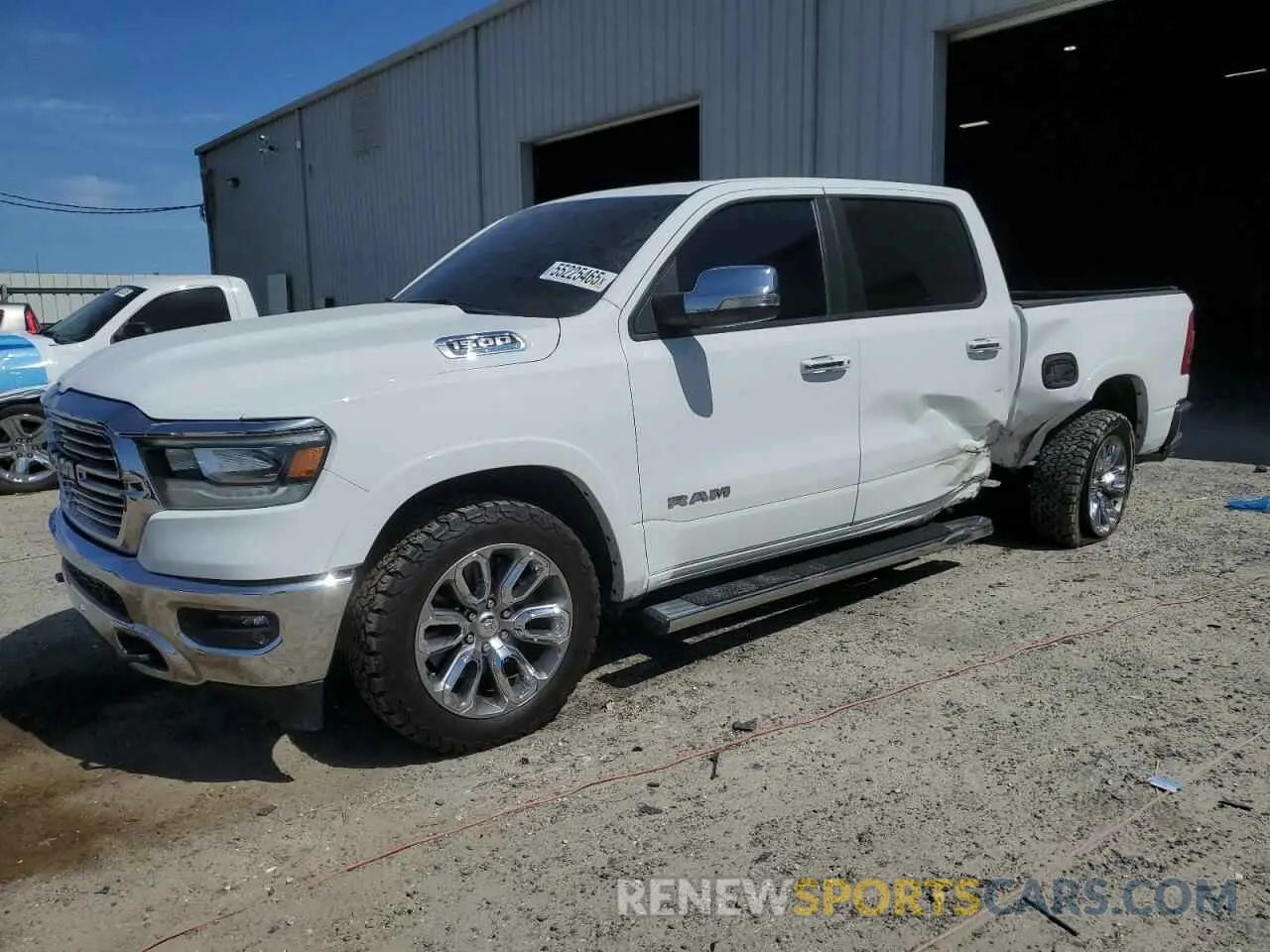 1 Photograph of a damaged car 1C6SRFJT3MN654873 RAM 1500 2021