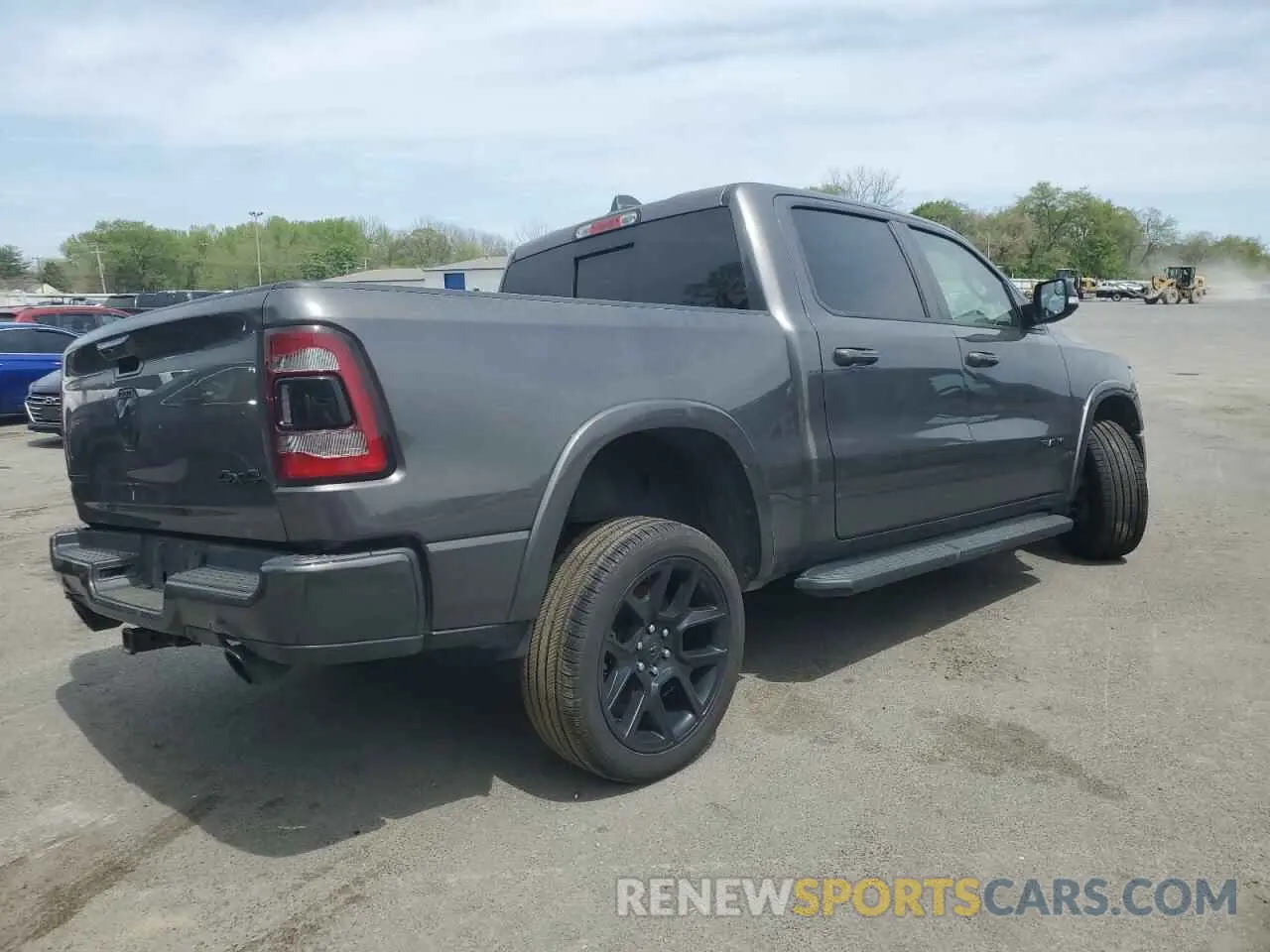 3 Photograph of a damaged car 1C6SRFJT4MN764069 RAM 1500 2021