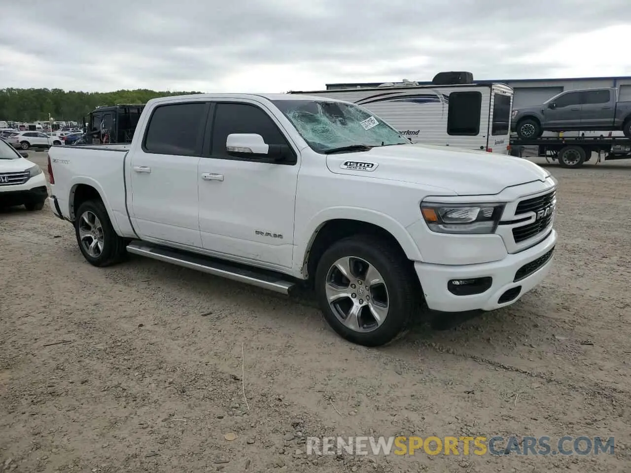 4 Photograph of a damaged car 1C6SRFJT5MN548568 RAM 1500 2021