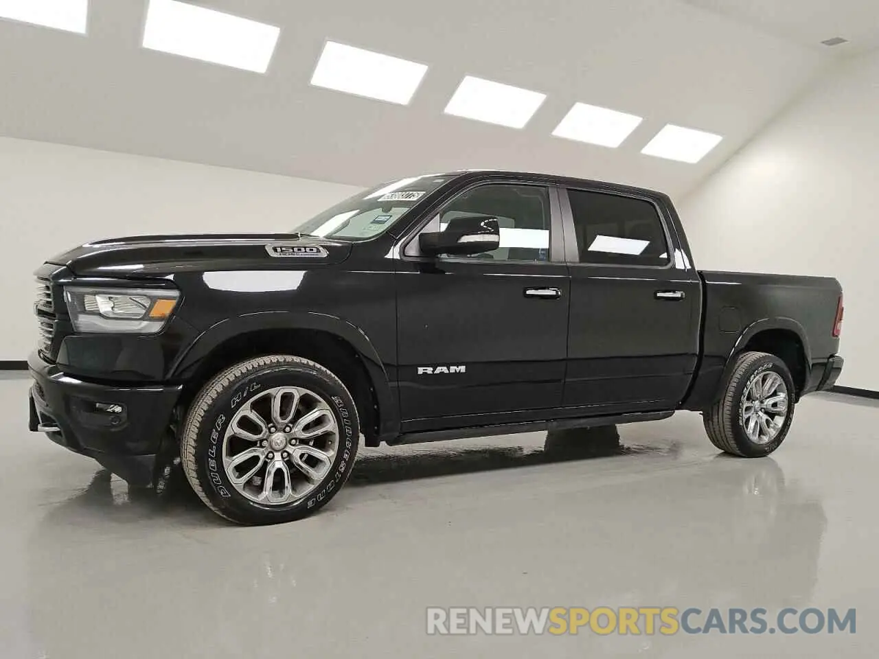 1 Photograph of a damaged car 1C6SRFJT5MN682576 RAM 1500 2021