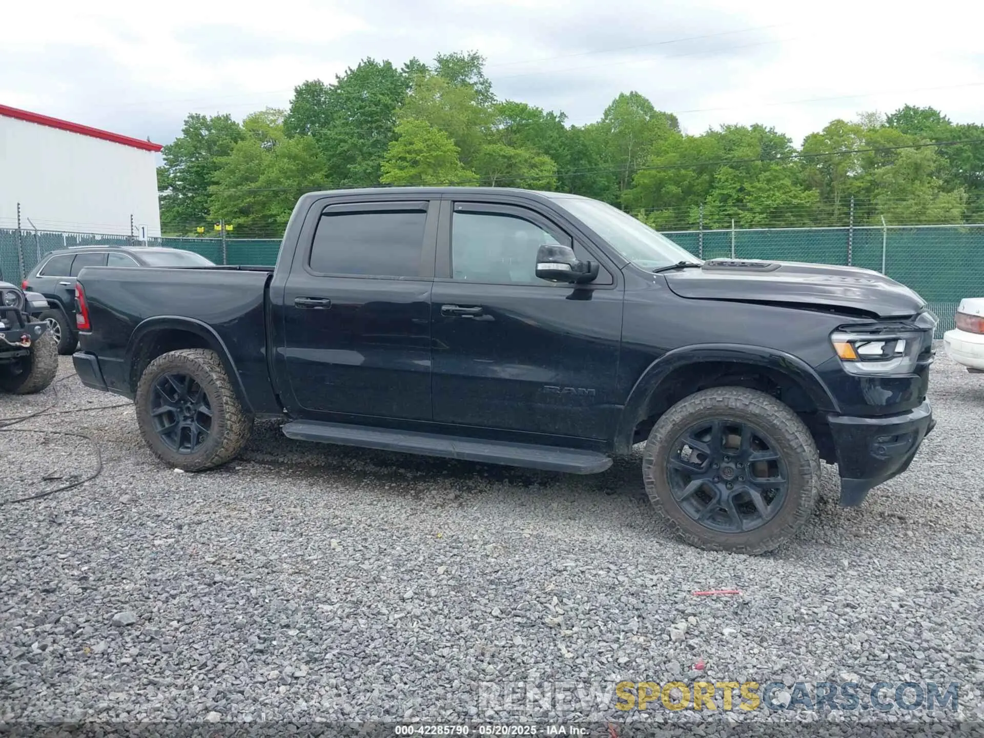 14 Photograph of a damaged car 1C6SRFJT5MN732344 RAM 1500 2021