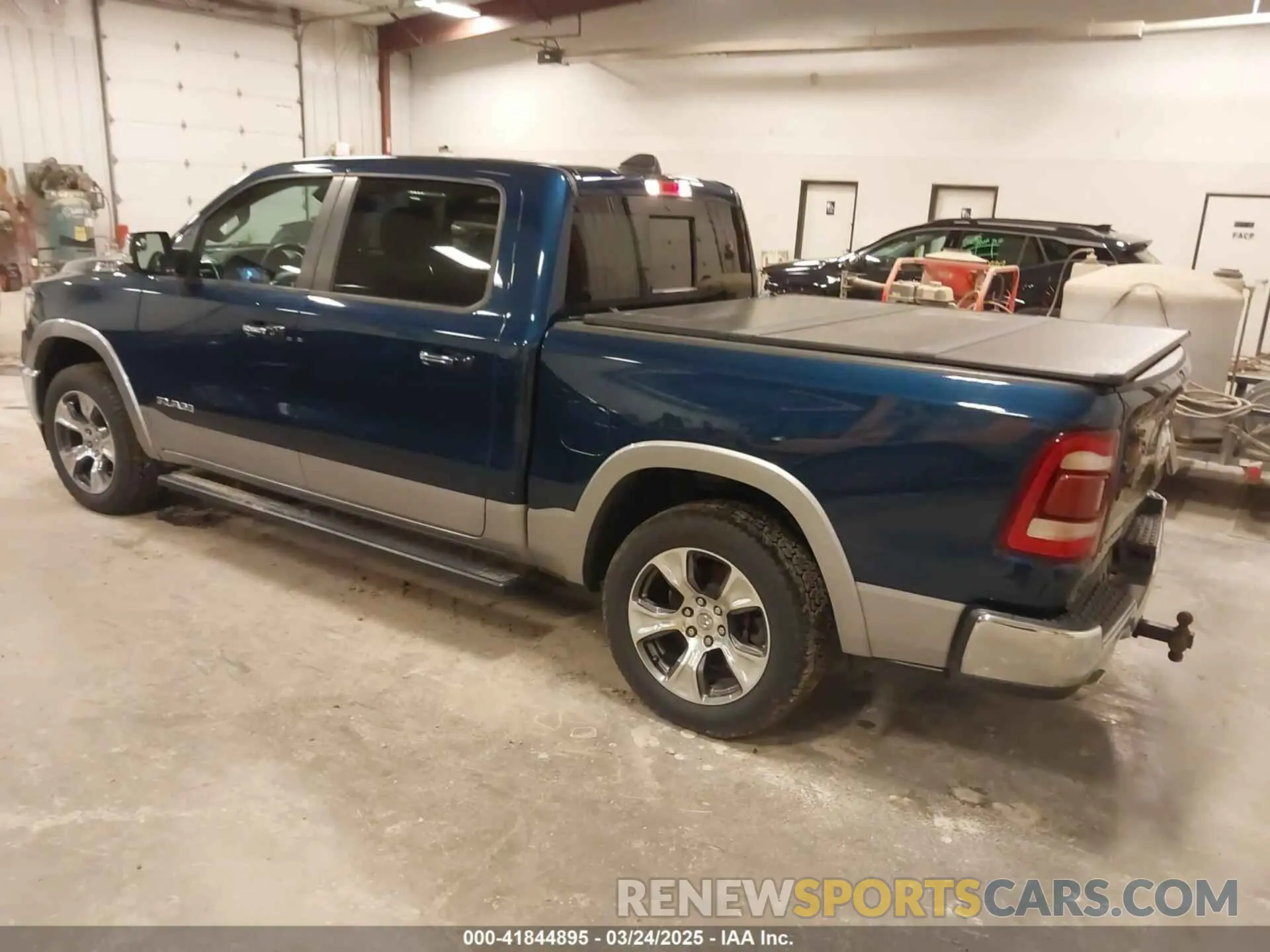 3 Photograph of a damaged car 1C6SRFJT6MN659212 RAM 1500 2021