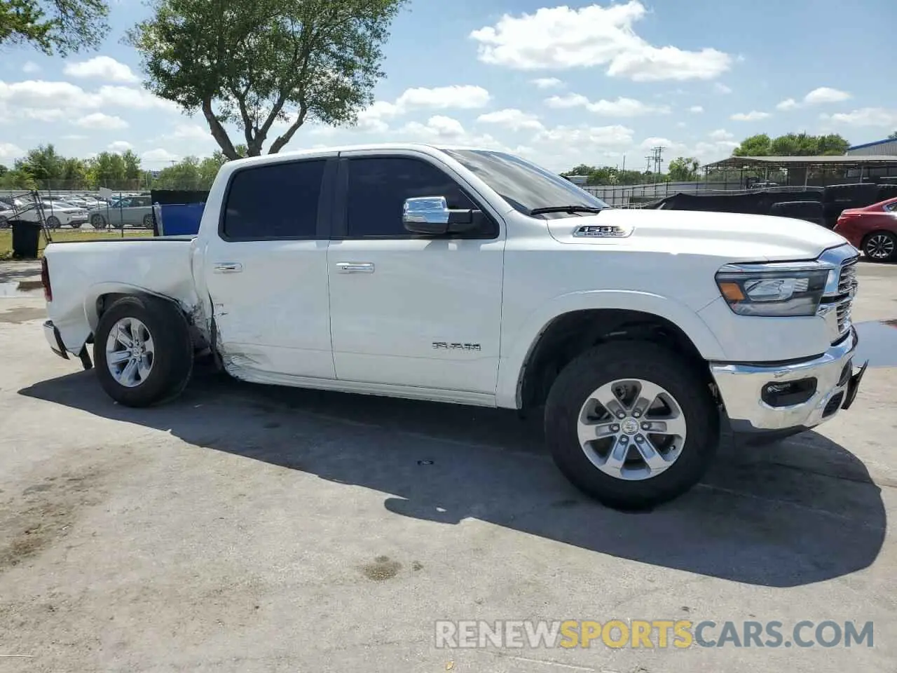 4 Photograph of a damaged car 1C6SRFJT6MN671165 RAM 1500 2021