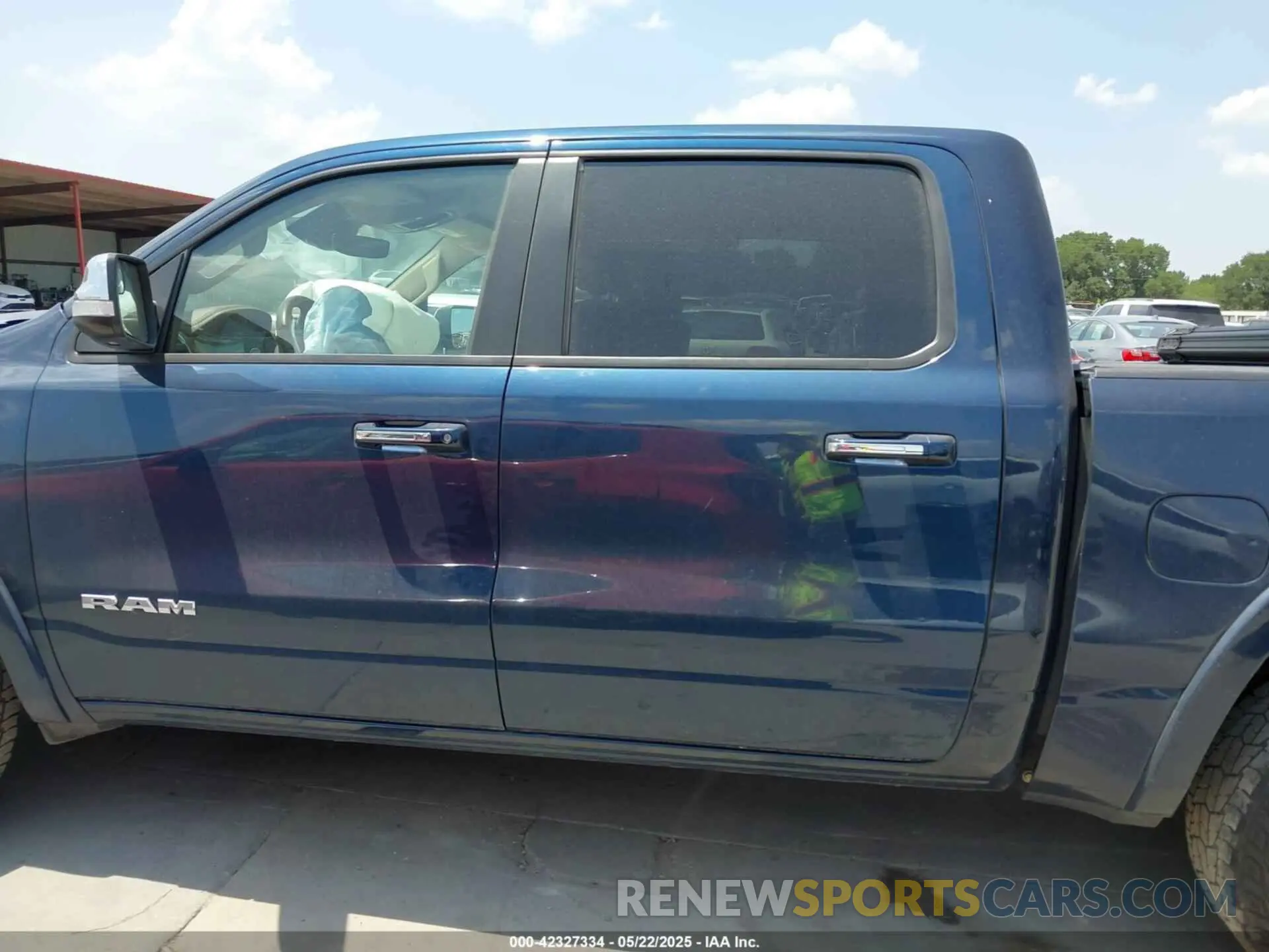 13 Photograph of a damaged car 1C6SRFJT6MN821694 RAM 1500 2021