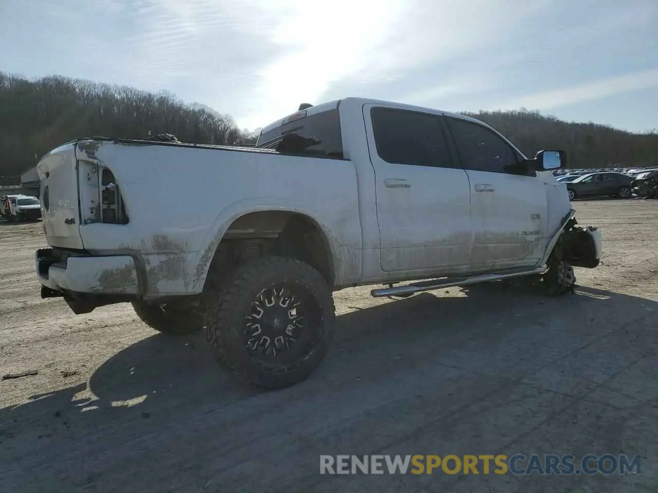 3 Photograph of a damaged car 1C6SRFJT8MN516777 RAM 1500 2021