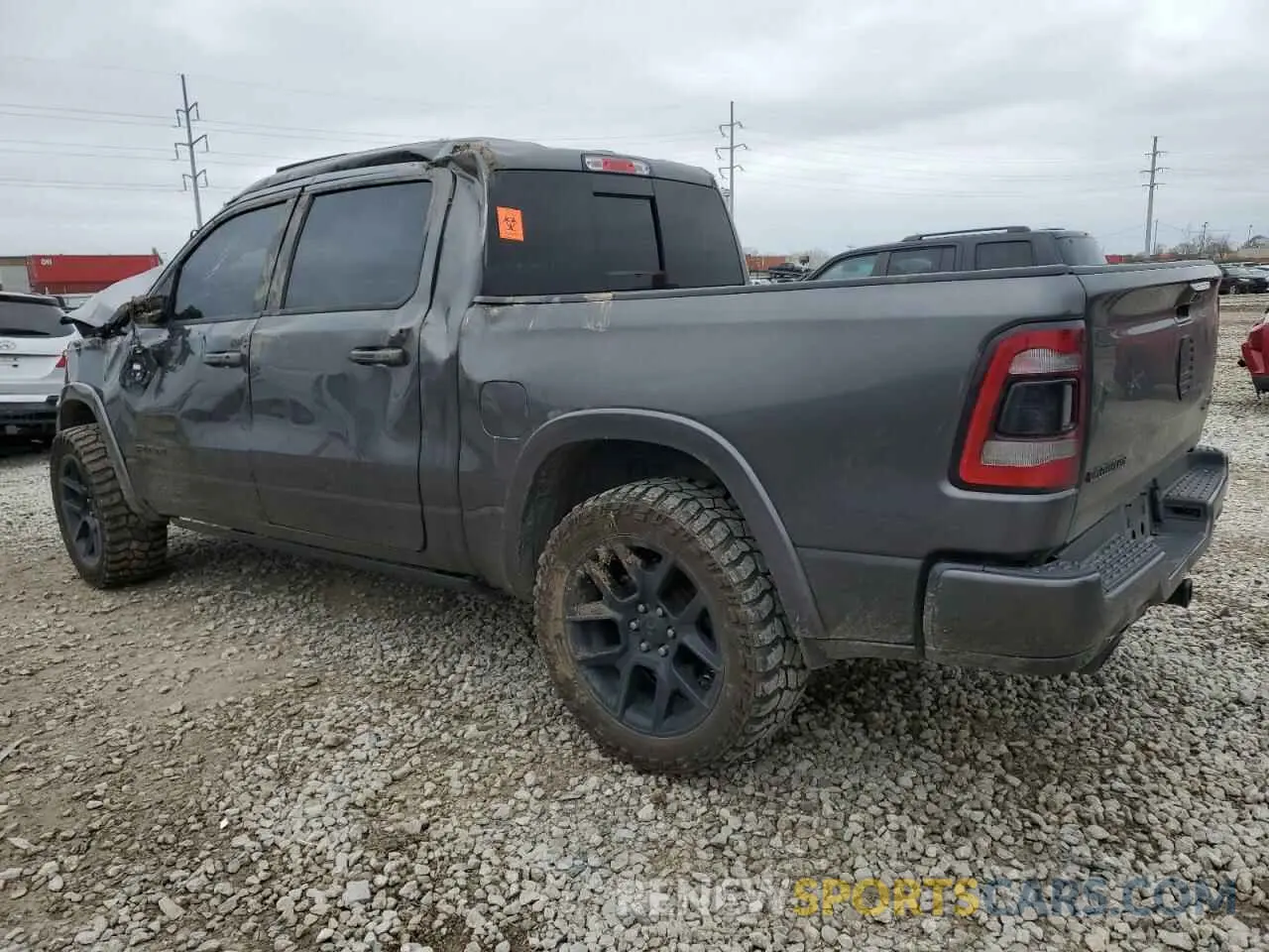 2 Photograph of a damaged car 1C6SRFJT8MN558866 RAM 1500 2021