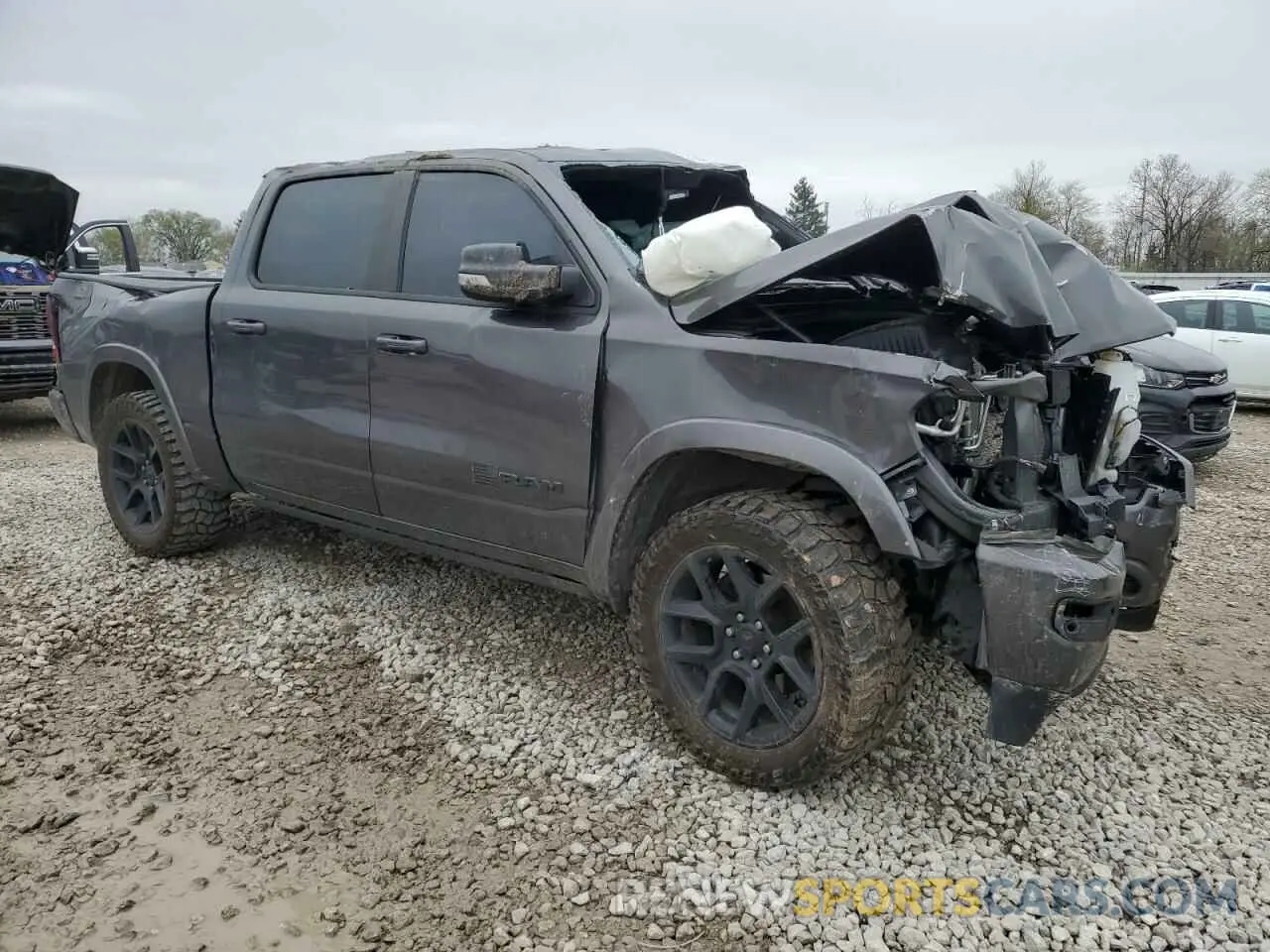 4 Photograph of a damaged car 1C6SRFJT8MN558866 RAM 1500 2021
