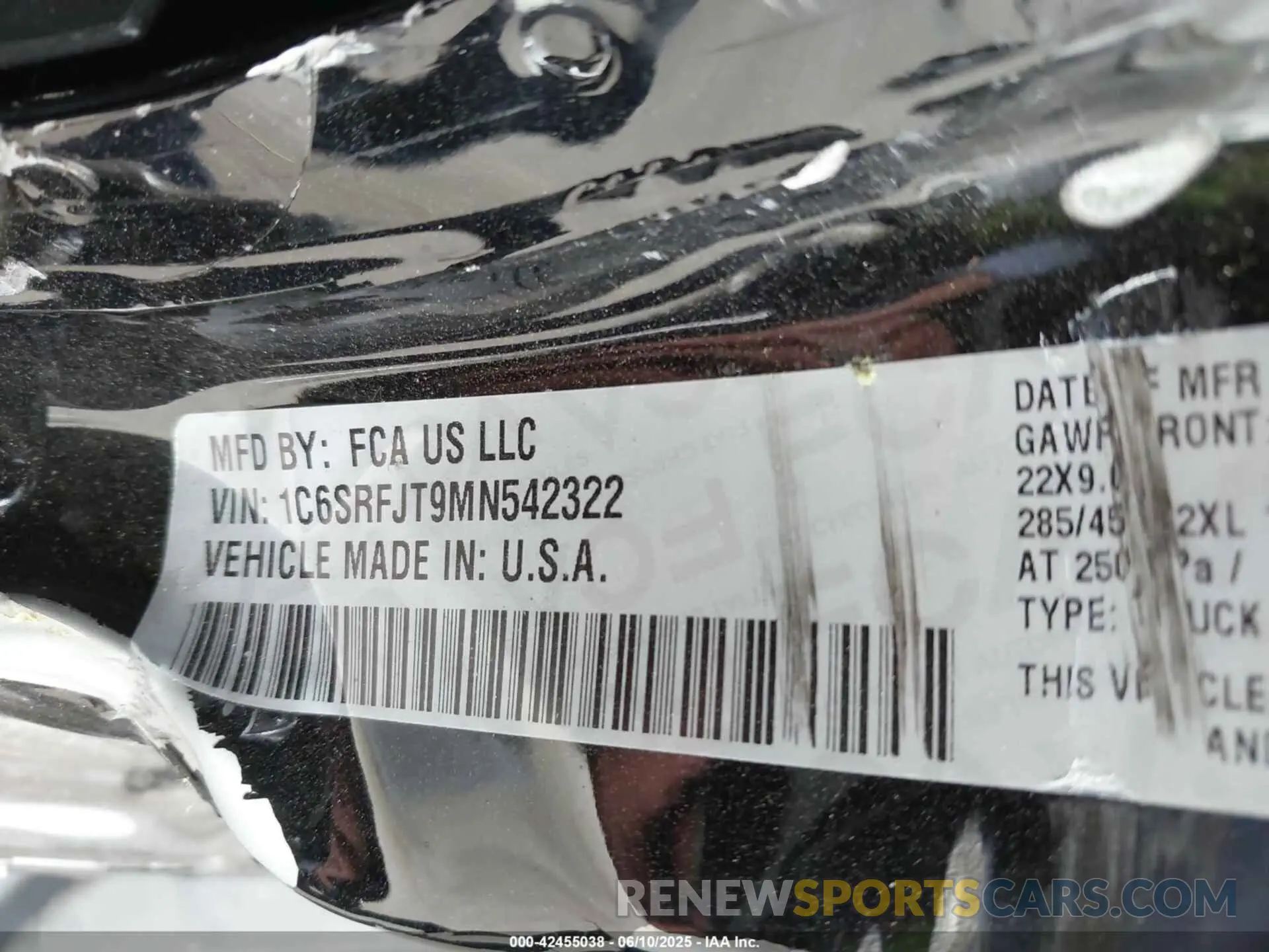 9 Photograph of a damaged car 1C6SRFJT9MN542322 RAM 1500 2021