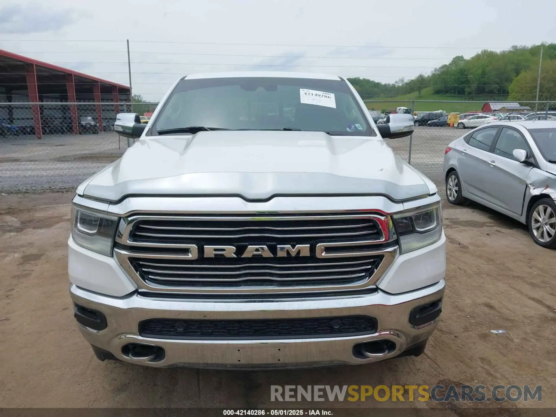 13 Photograph of a damaged car 1C6SRFJT9MN576017 RAM 1500 2021
