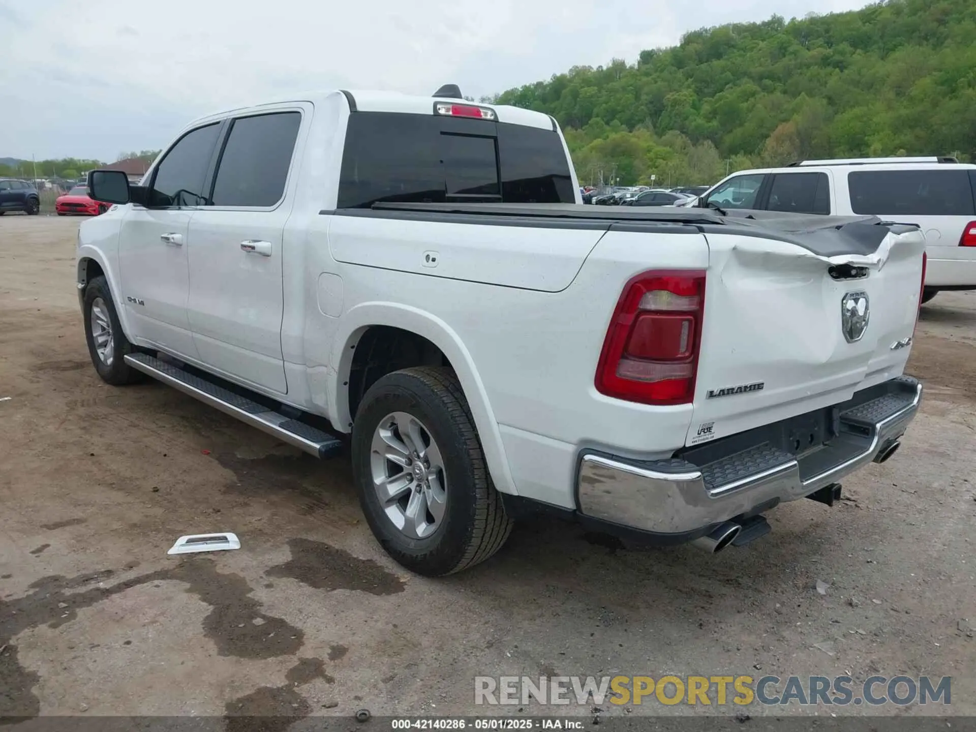 3 Photograph of a damaged car 1C6SRFJT9MN576017 RAM 1500 2021