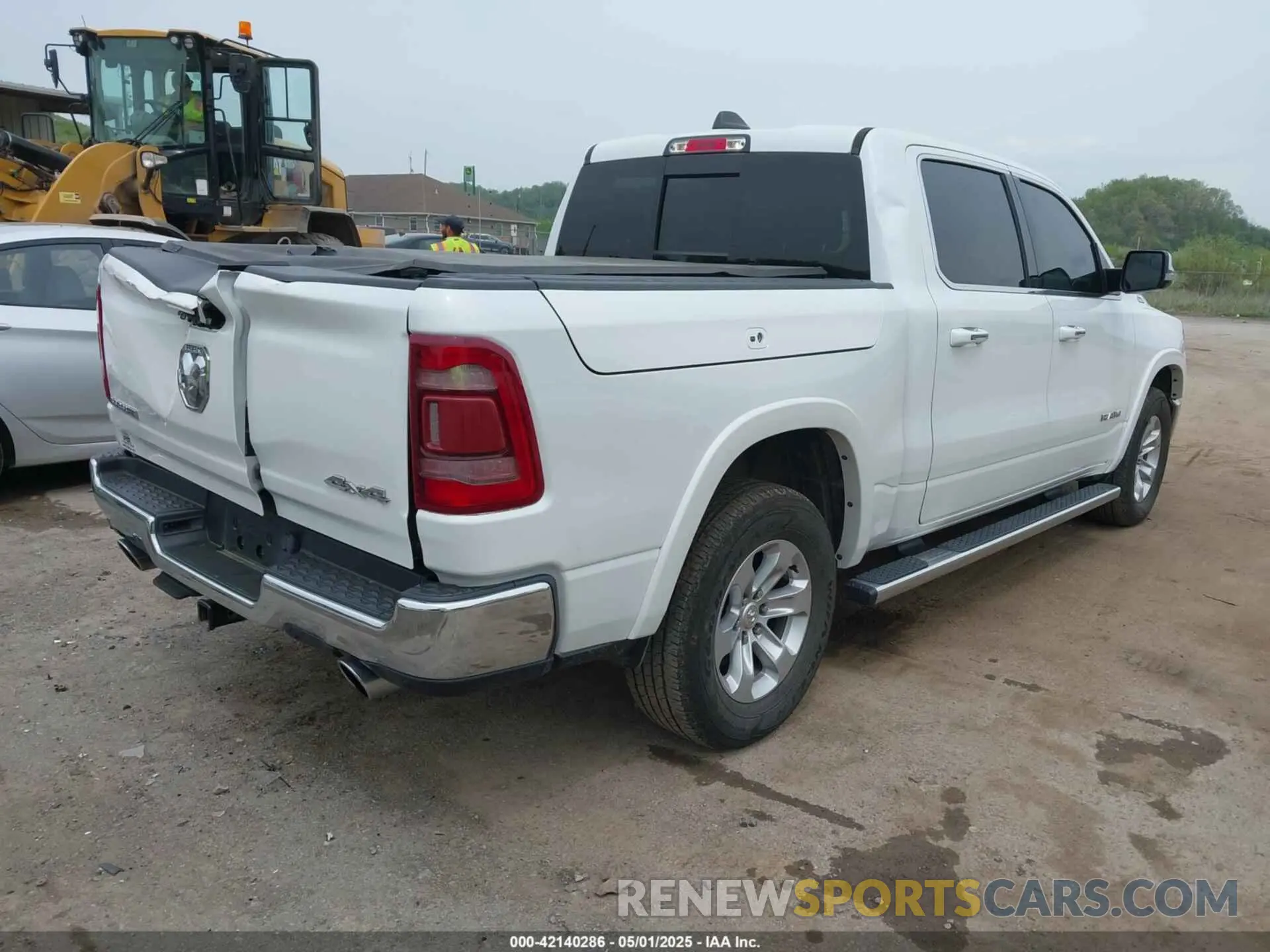 4 Photograph of a damaged car 1C6SRFJT9MN576017 RAM 1500 2021