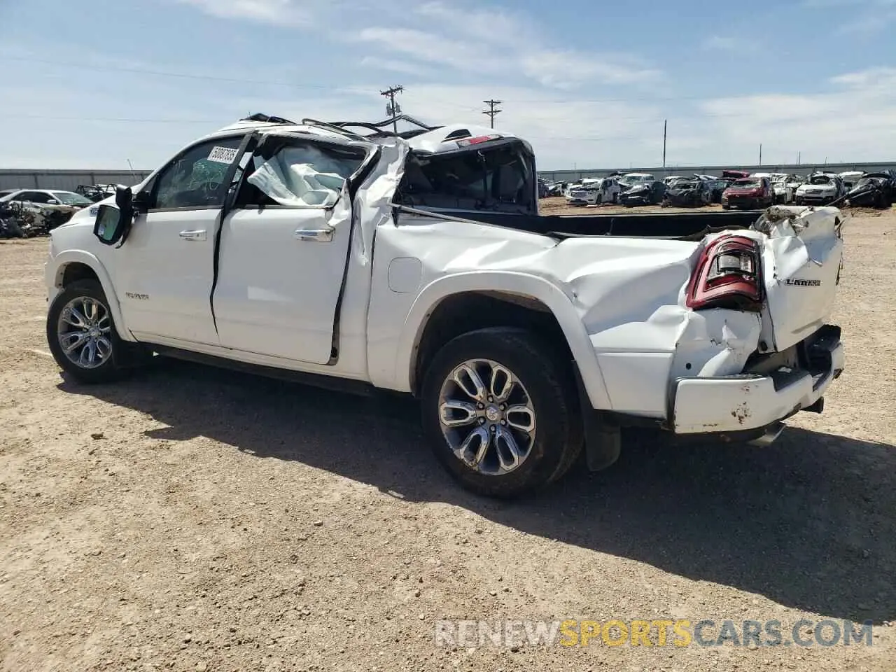2 Photograph of a damaged car 1C6SRFJT9MN642999 RAM 1500 2021